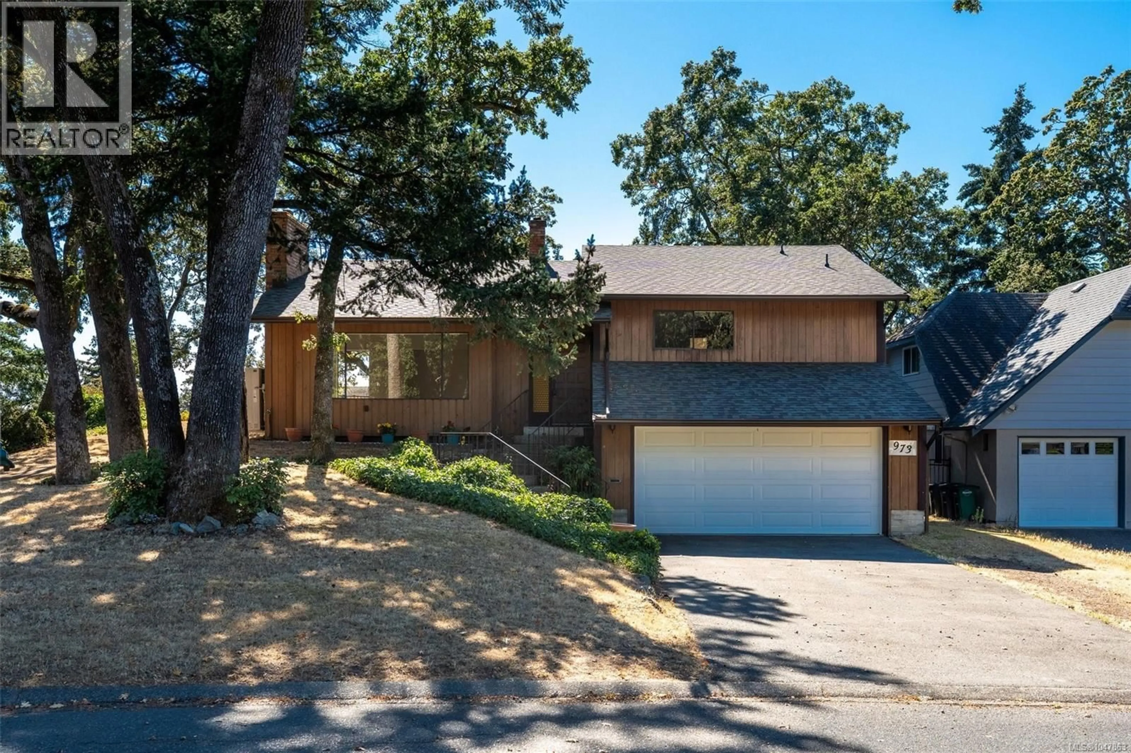 Home with brick exterior material, street for 973 LANDEEN PLACE, Saanich British Columbia V8X3Z4