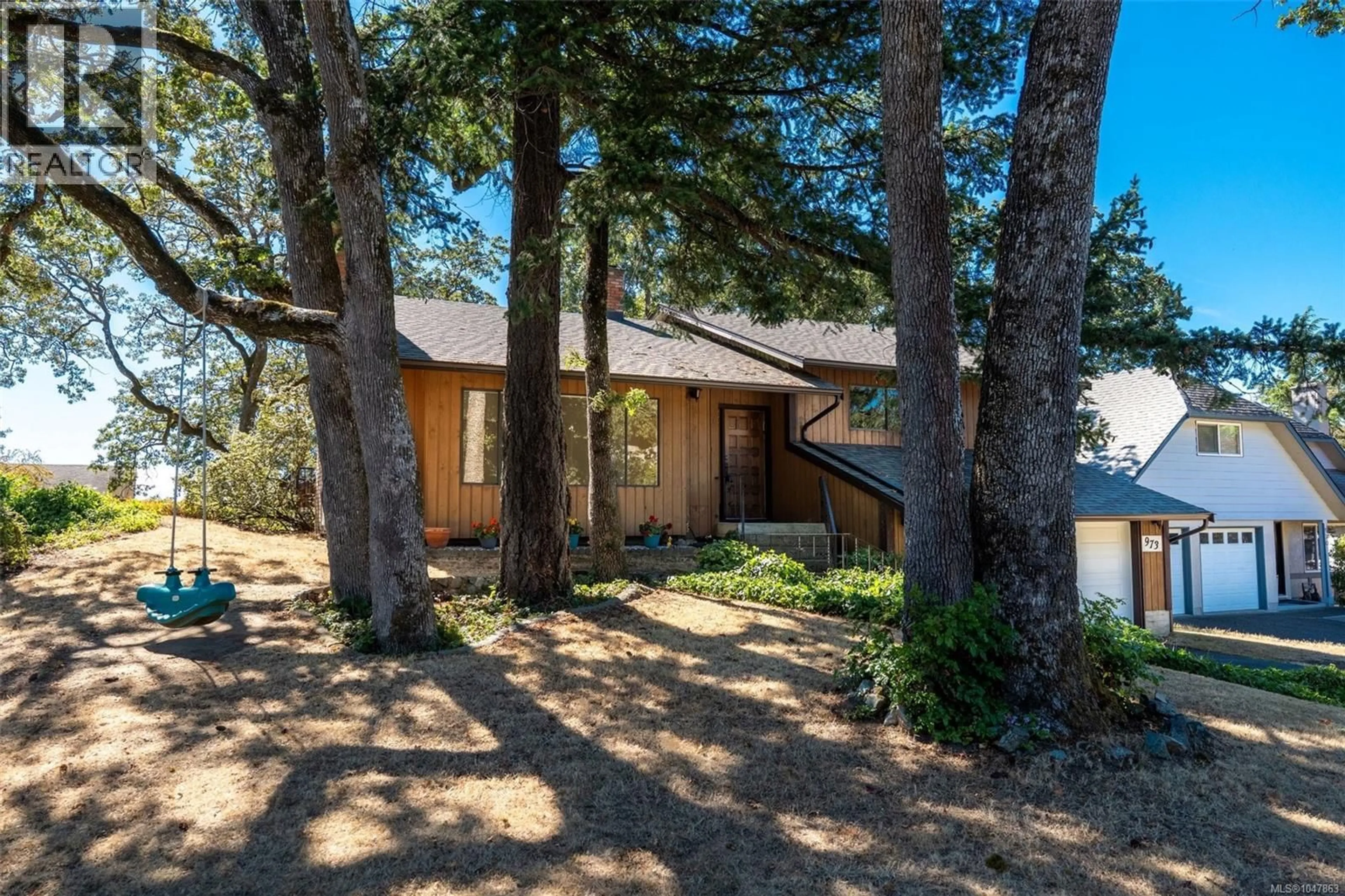 A pic from outside/outdoor area/front of a property/back of a property/a pic from drone, water/lake/river/ocean view for 973 LANDEEN PLACE, Saanich British Columbia V8X3Z4