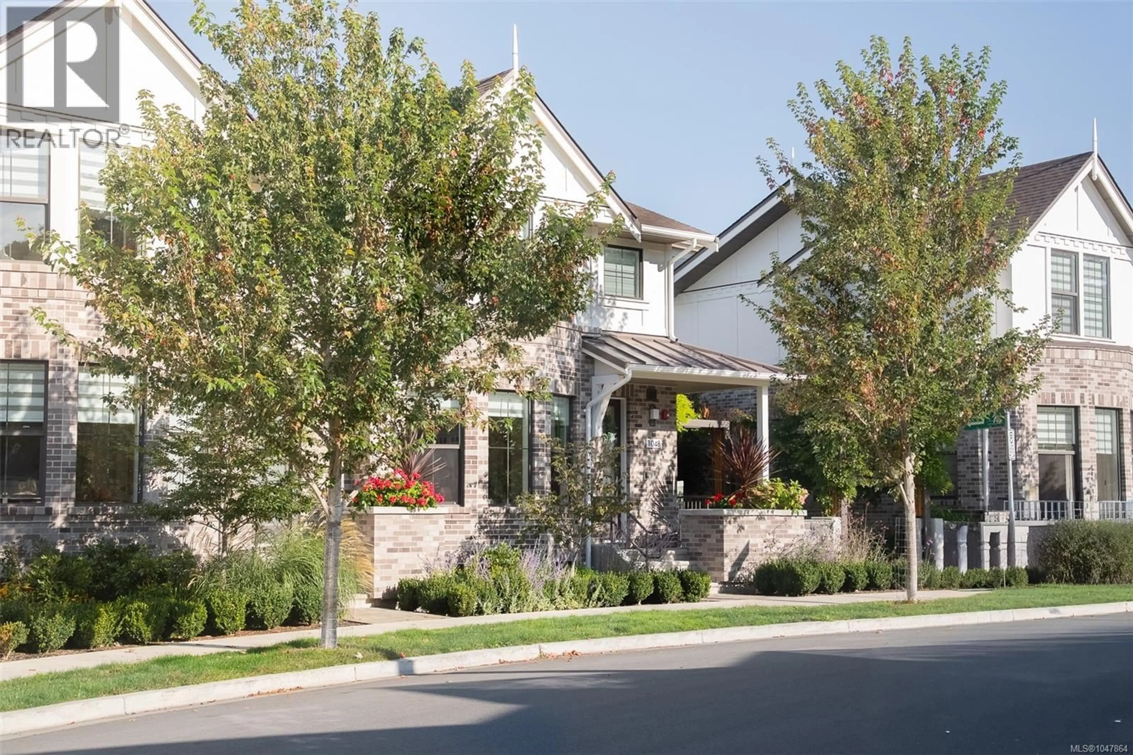 Home with brick exterior material, street for 1048 PENTRELEW PLACE, Victoria British Columbia V8V3L1