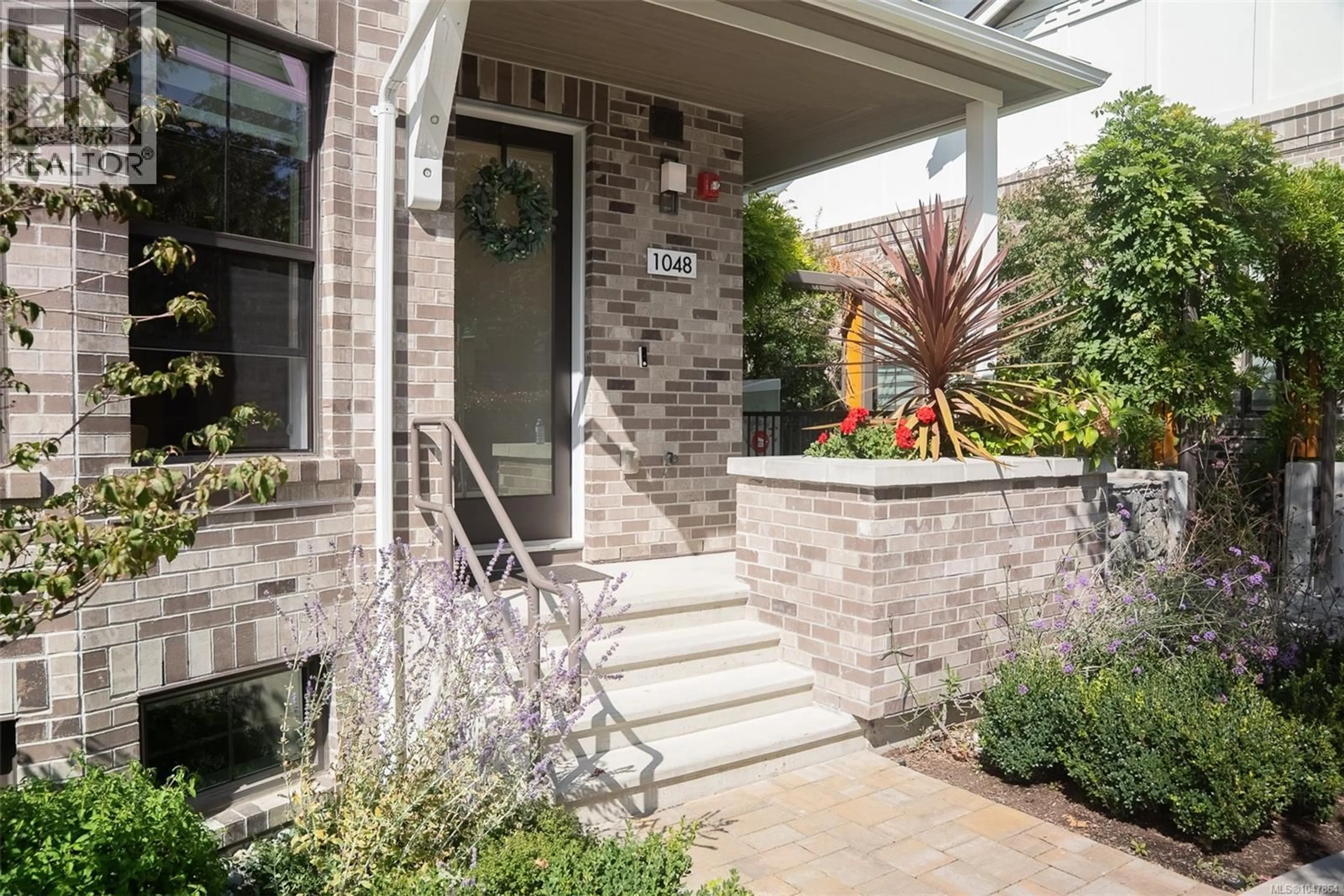 Home with brick exterior material, street for 1048 PENTRELEW PLACE, Victoria British Columbia V8V3L1