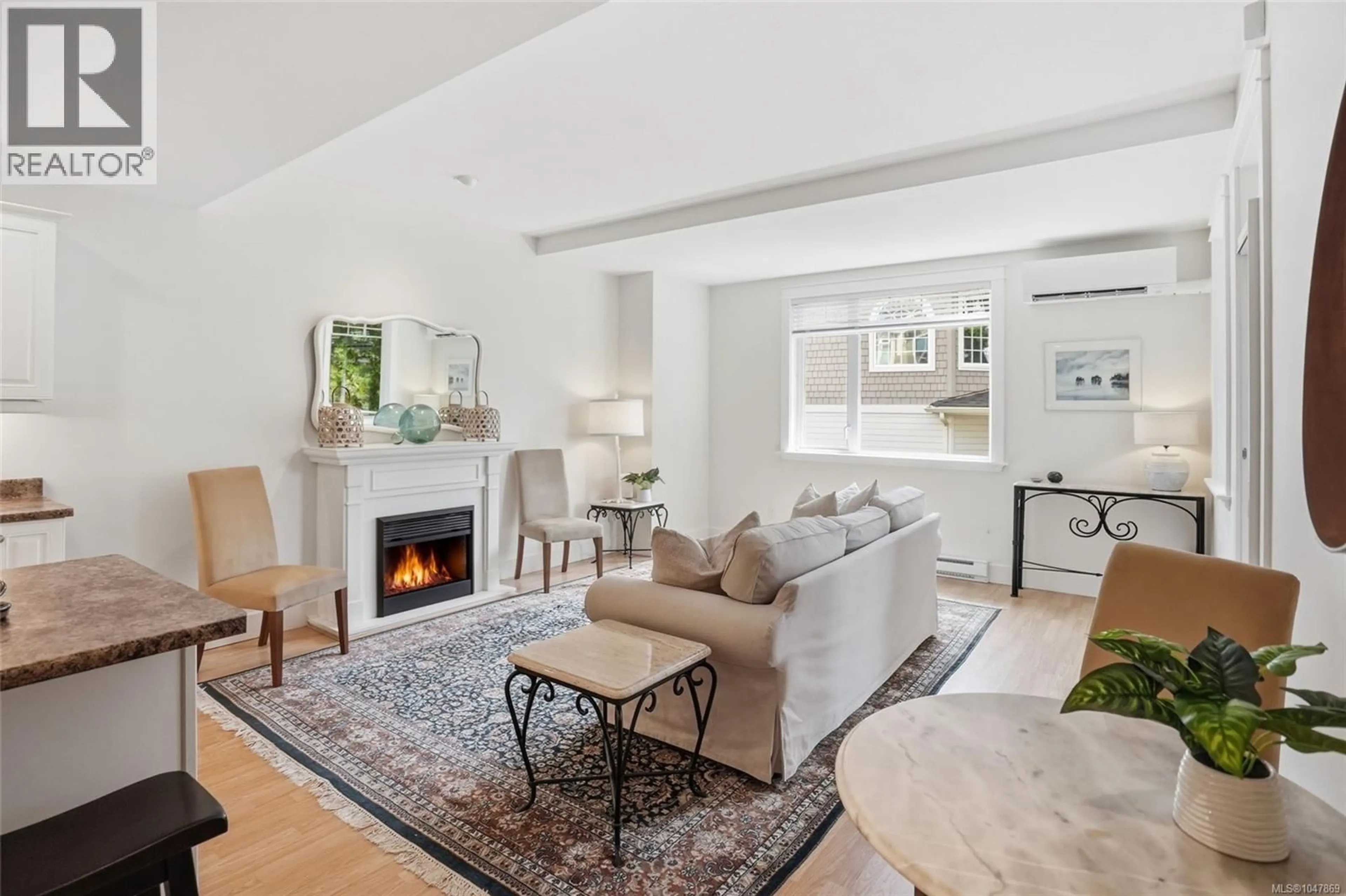 Living room with furniture, unknown for 101 - 193 SECOND AVENUE WEST, Qualicum Beach British Columbia V9K2N5