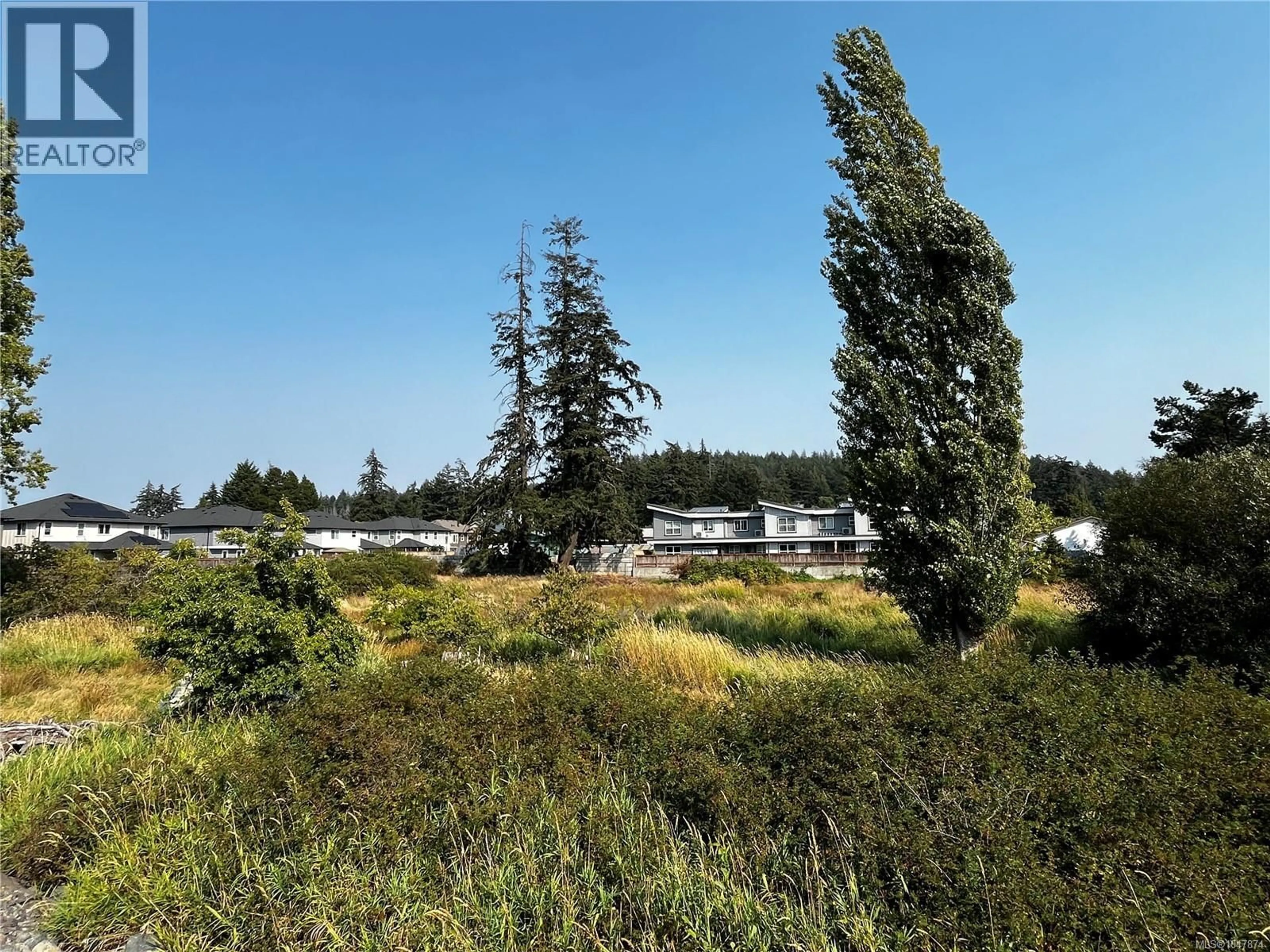 A pic from outside/outdoor area/front of a property/back of a property/a pic from drone, forest/trees view for 3409 LUXTON ROAD, Langford British Columbia V9Z2Z3