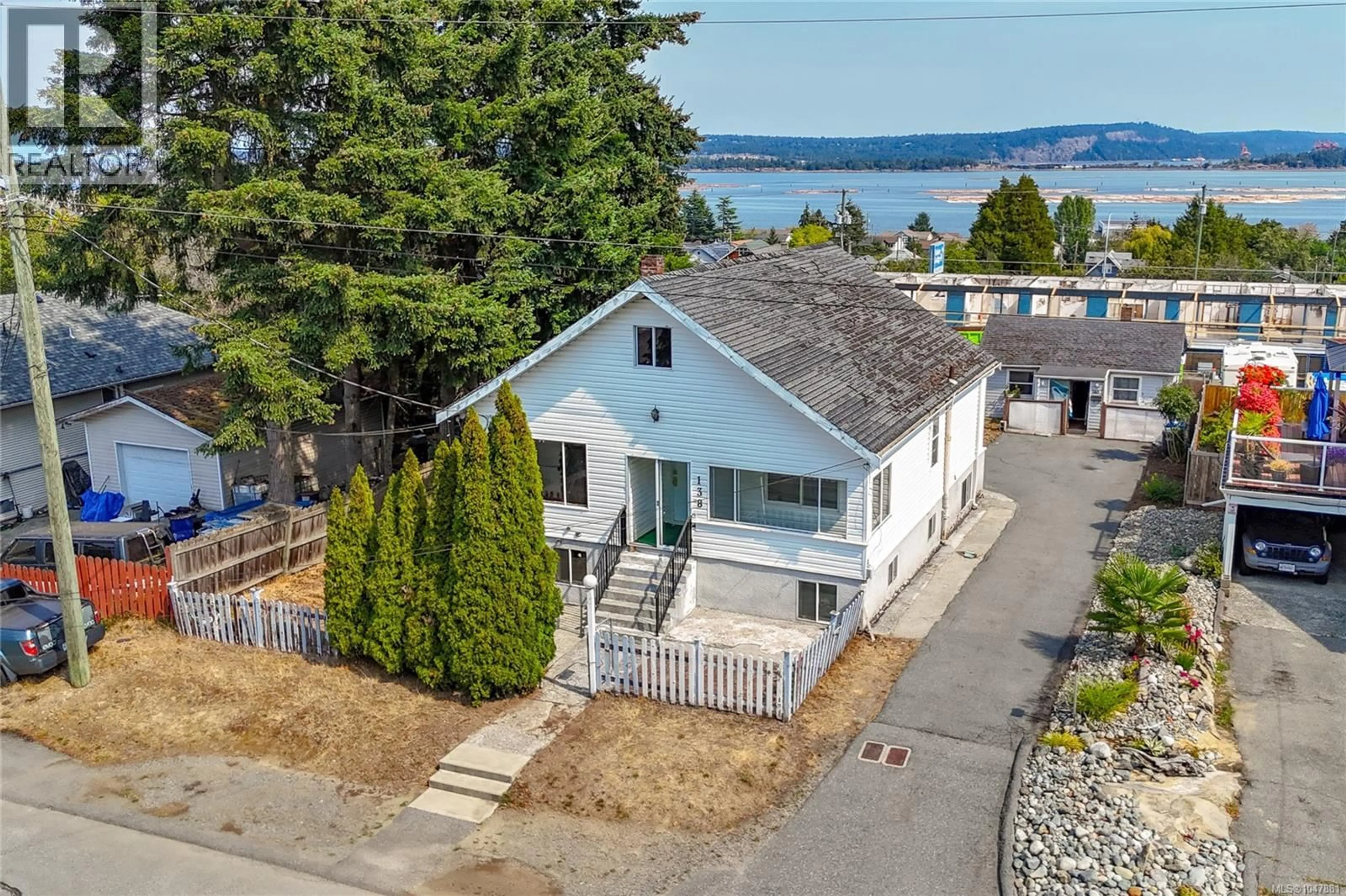 A pic from outside/outdoor area/front of a property/back of a property/a pic from drone, water/lake/river/ocean view for 138 STRICKLAND STREET, Nanaimo British Columbia V9R4S2