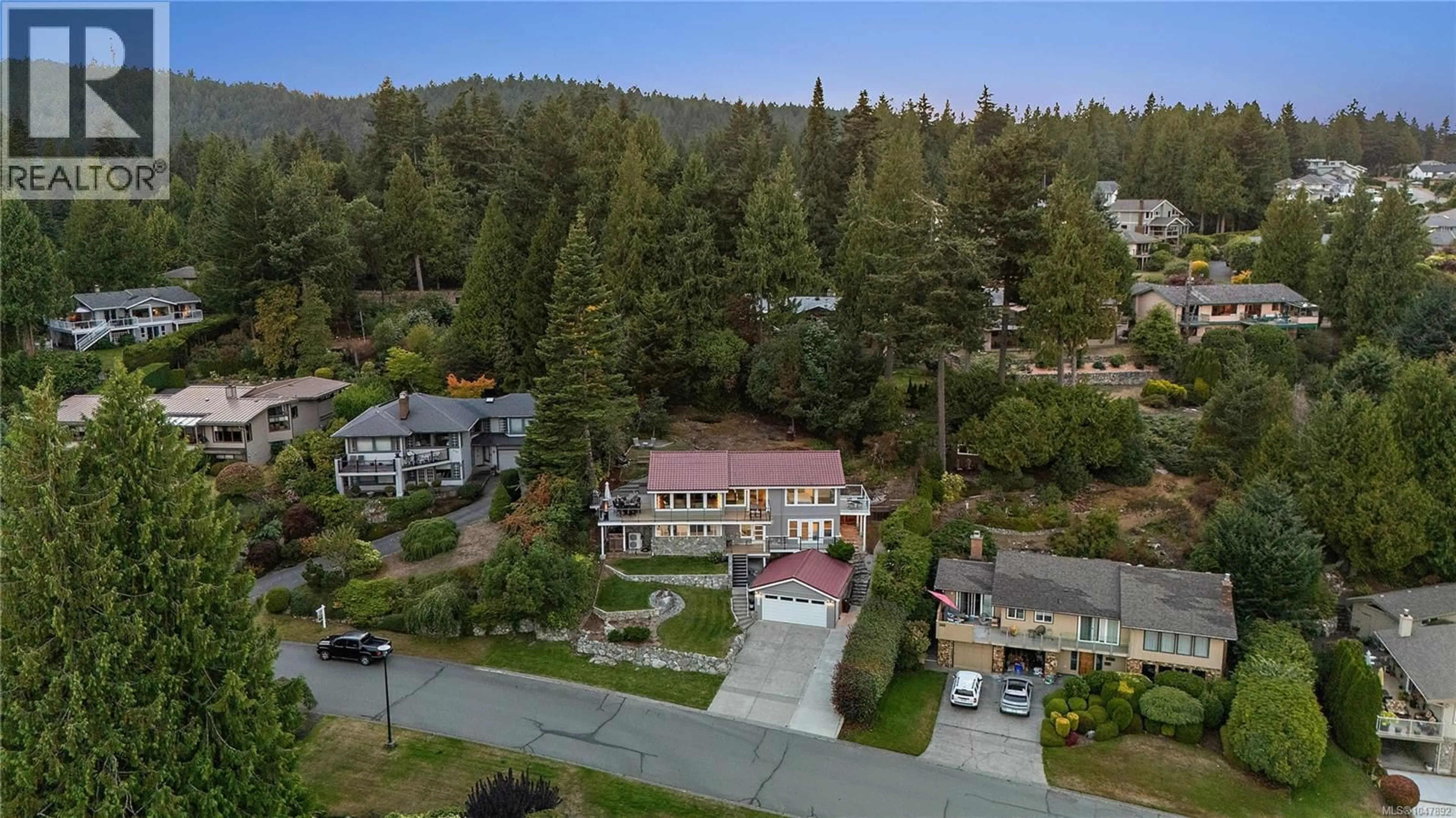 A pic from outside/outdoor area/front of a property/back of a property/a pic from drone, mountain view for 8750 PENDER PARK DRIVE, North Saanich British Columbia V8L3Z5