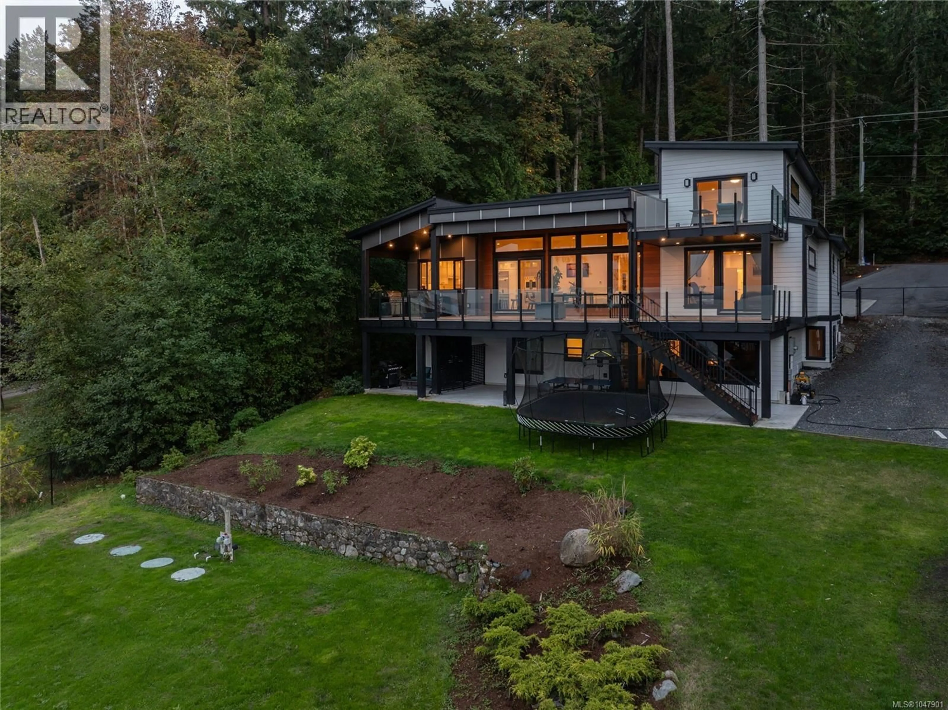 A pic from outside/outdoor area/front of a property/back of a property/a pic from drone, unknown for 1470 LANDS END ROAD, North Saanich British Columbia V8L5K1