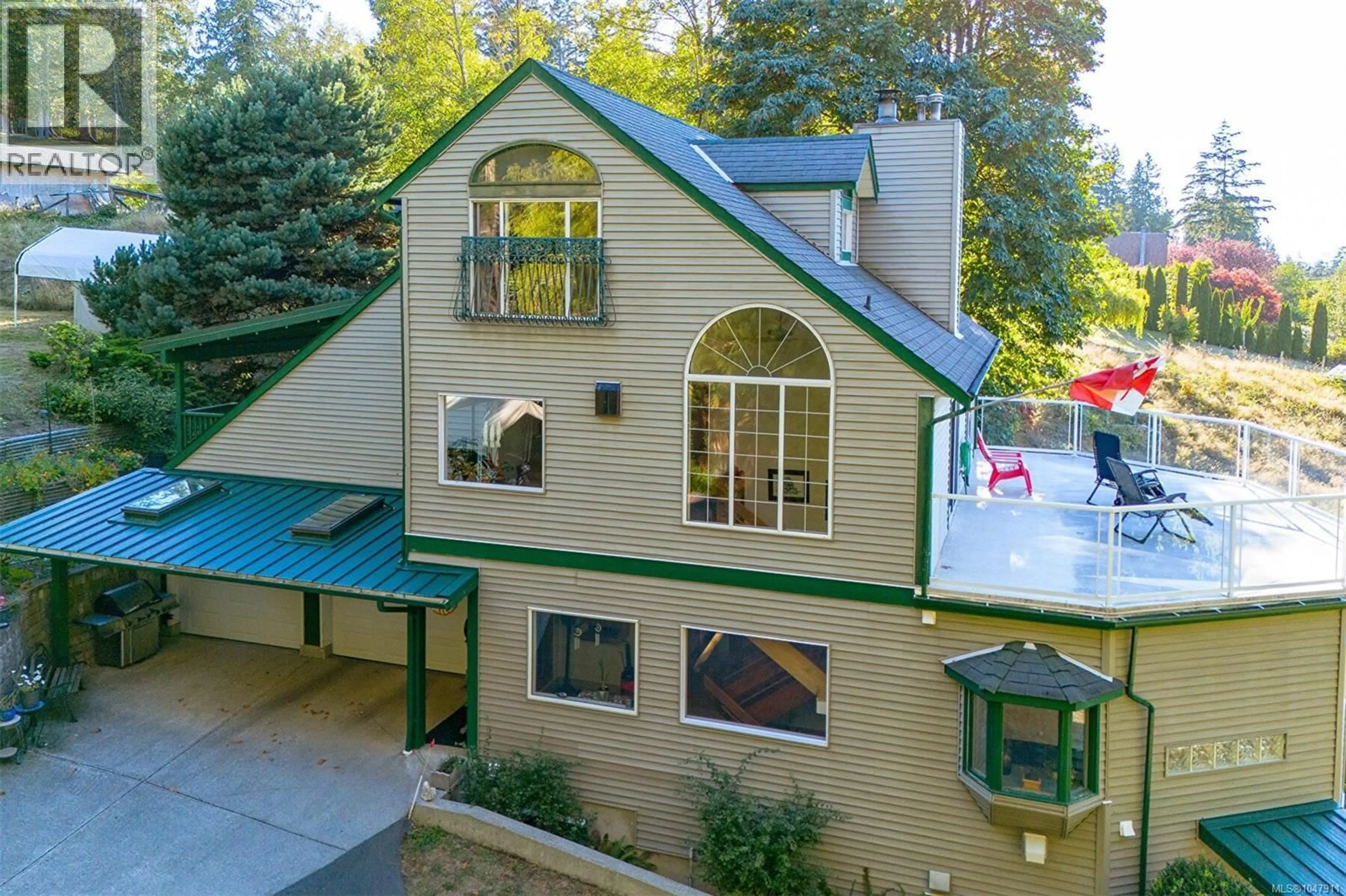 A pic from outside/outdoor area/front of a property/back of a property/a pic from drone, unknown for 7815 LANTZVILLE ROAD, Lantzville British Columbia V0R2H0