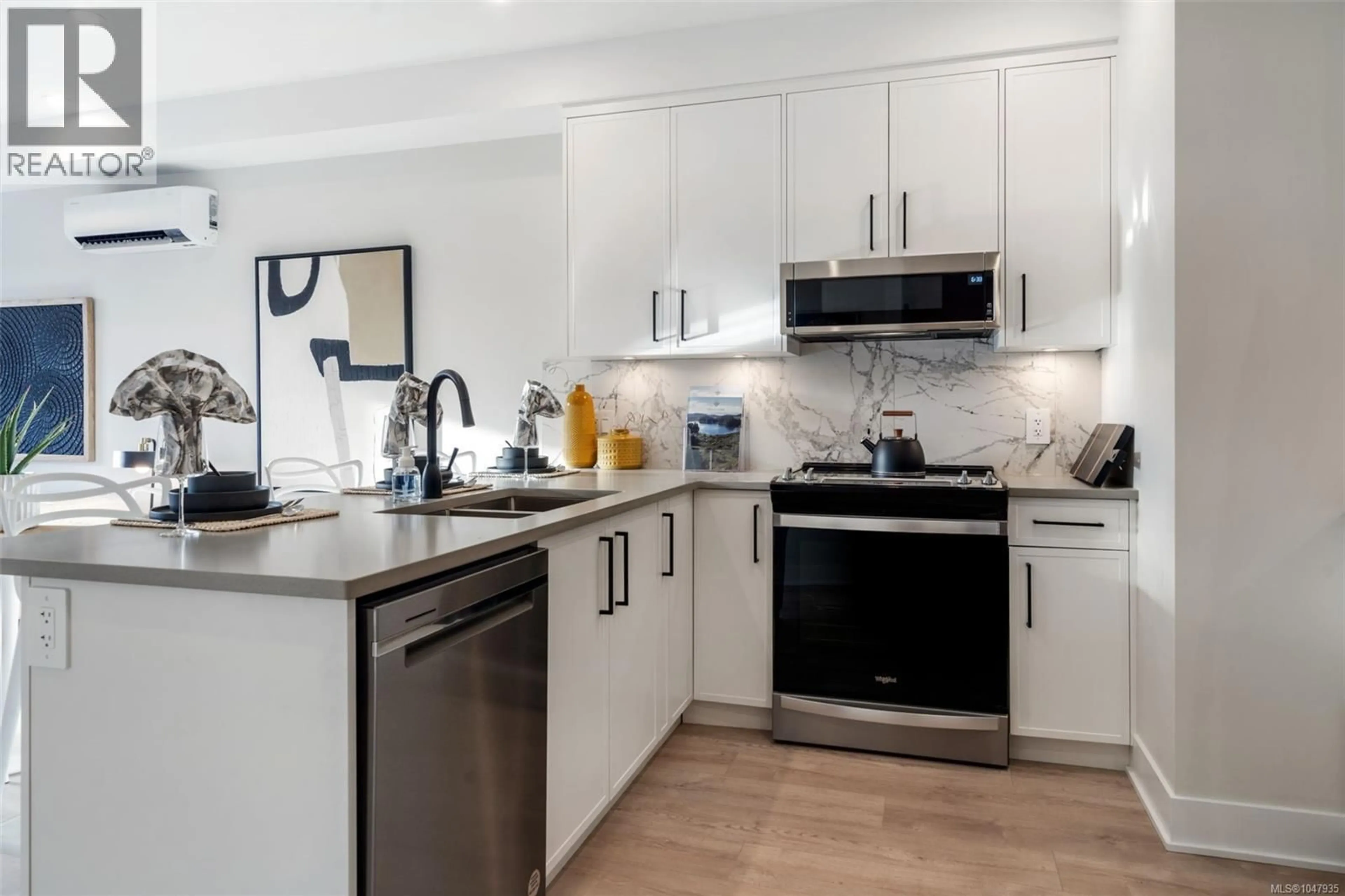 Open concept kitchen, ceramic/tile floor for 602 - 1371 GOLDSTREAM AVENUE, Langford British Columbia V9B7B7
