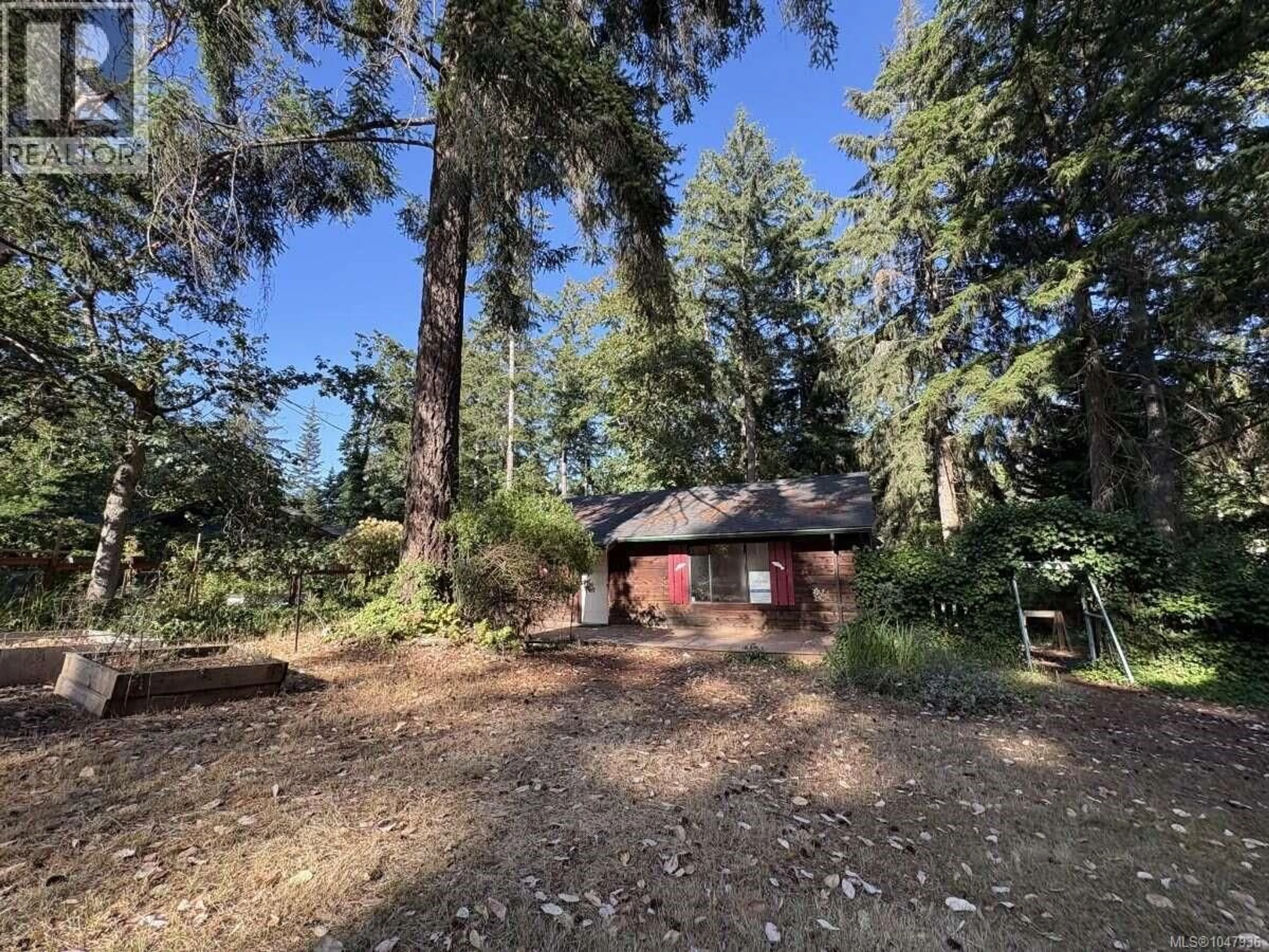 A pic from outside/outdoor area/front of a property/back of a property/a pic from drone, forest/trees view for 23 PIRATES LANE, Protection Island British Columbia V9R6R1