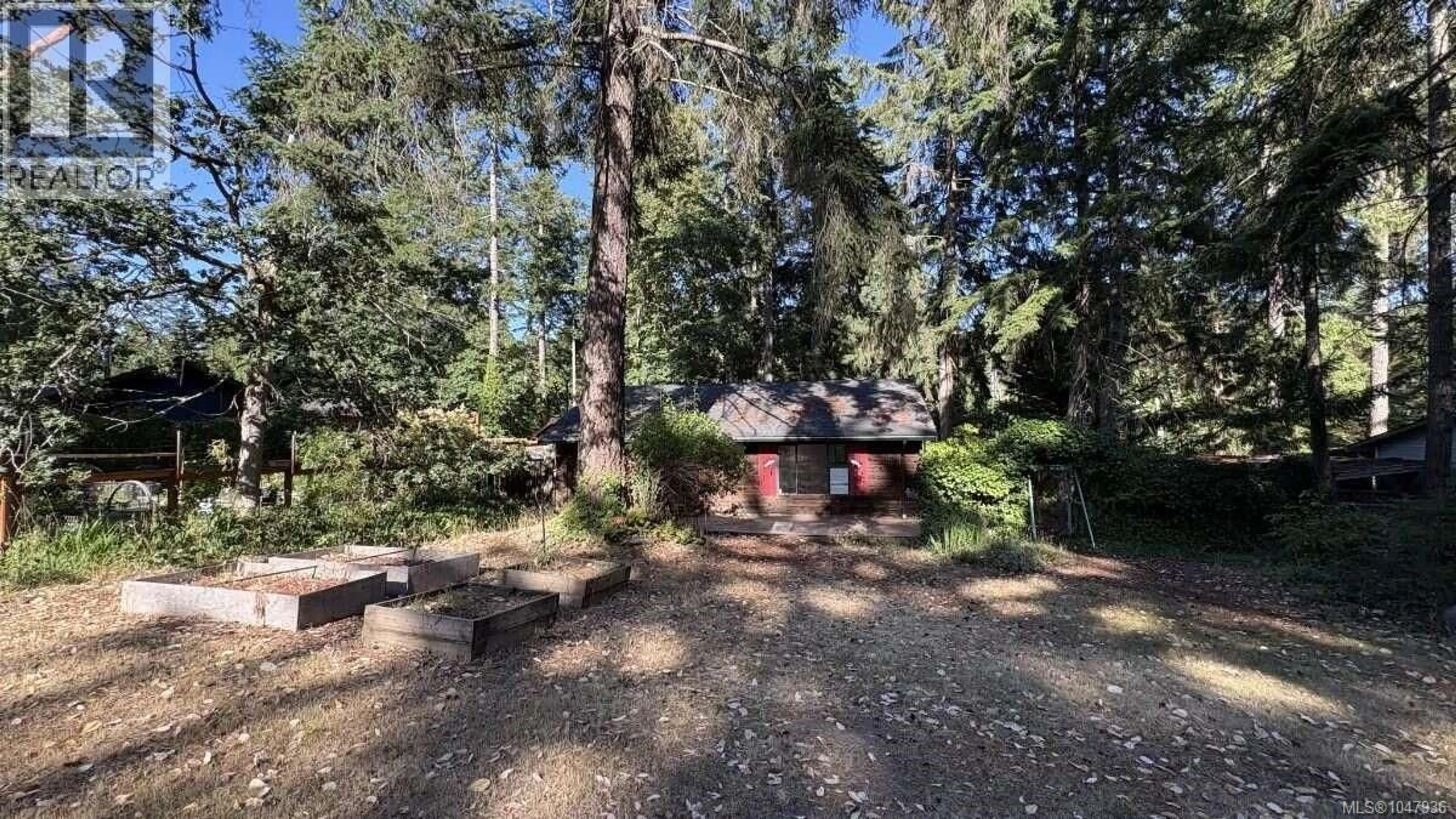 A pic from outside/outdoor area/front of a property/back of a property/a pic from drone, forest/trees view for 23 PIRATES LANE, Protection Island British Columbia V9R6R1