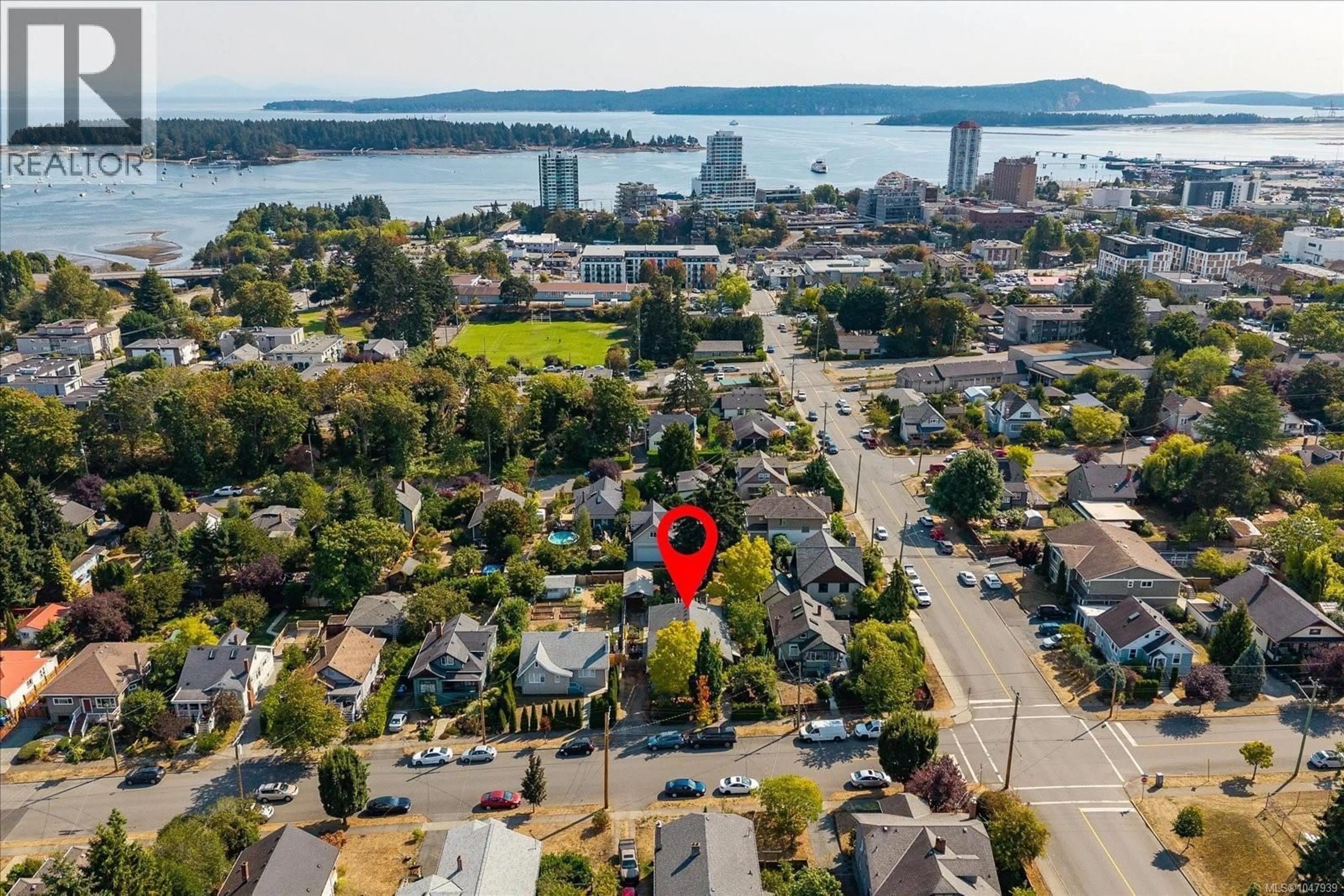 A pic from outside/outdoor area/front of a property/back of a property/a pic from drone, water/lake/river/ocean view for 66 KENNEDY STREET, Nanaimo British Columbia V9R2H6