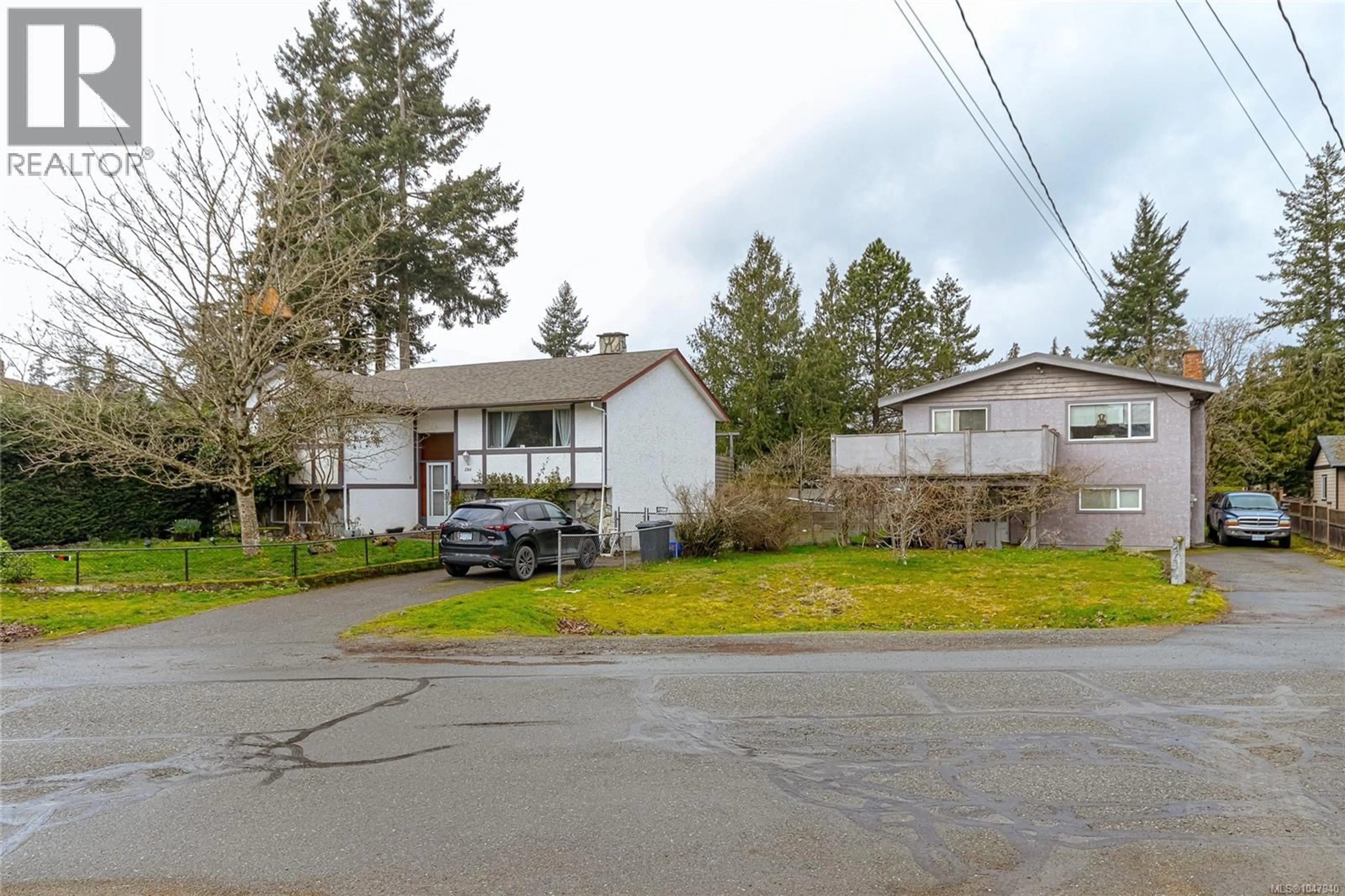 A pic from outside/outdoor area/front of a property/back of a property/a pic from drone, street for 2754 SCAFE ROAD, Langford British Columbia V9B3W7