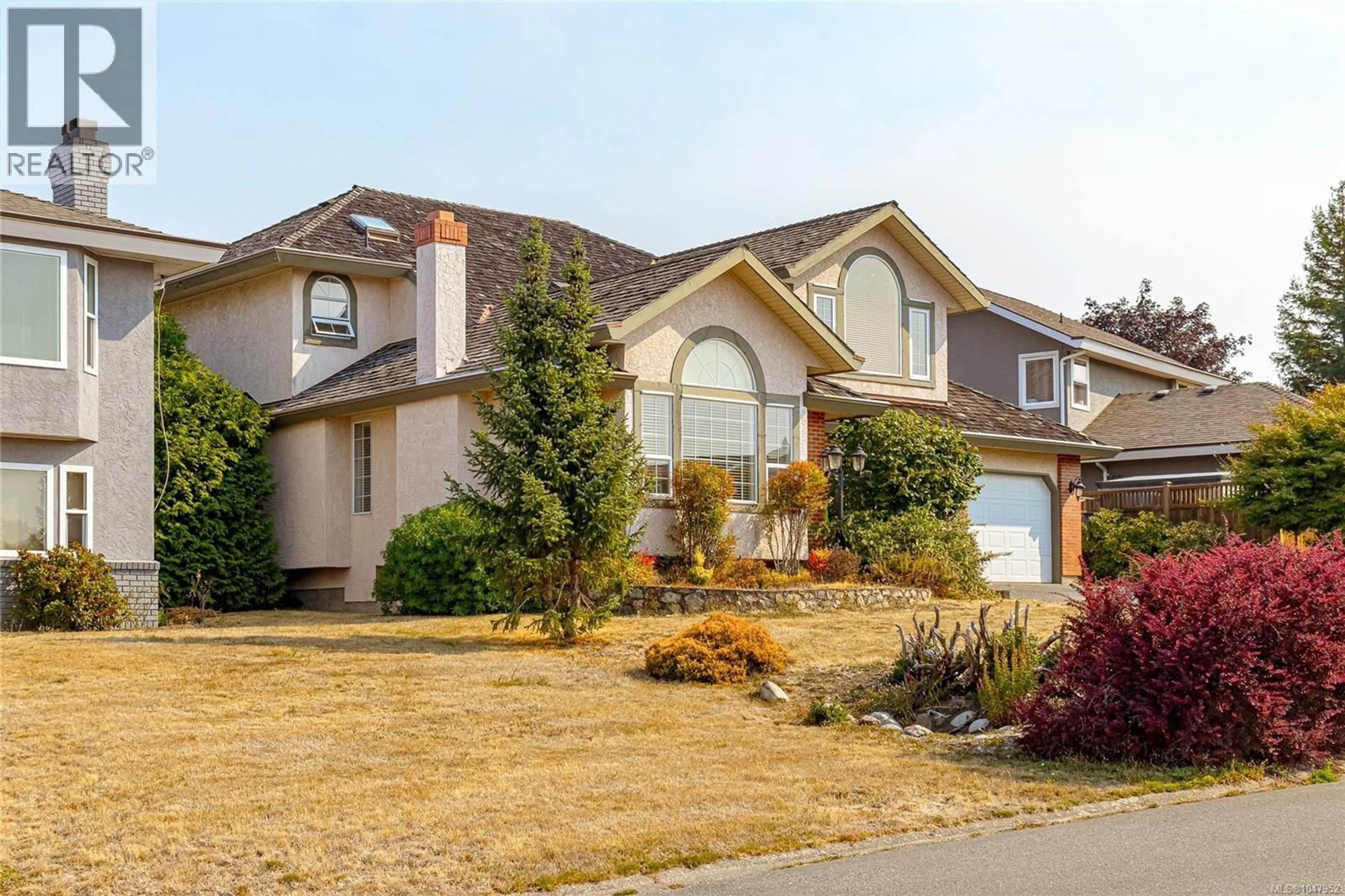 Home with vinyl exterior material, street for 1880 FRANCISCO TERRACE, Saanich British Columbia V8N6J2