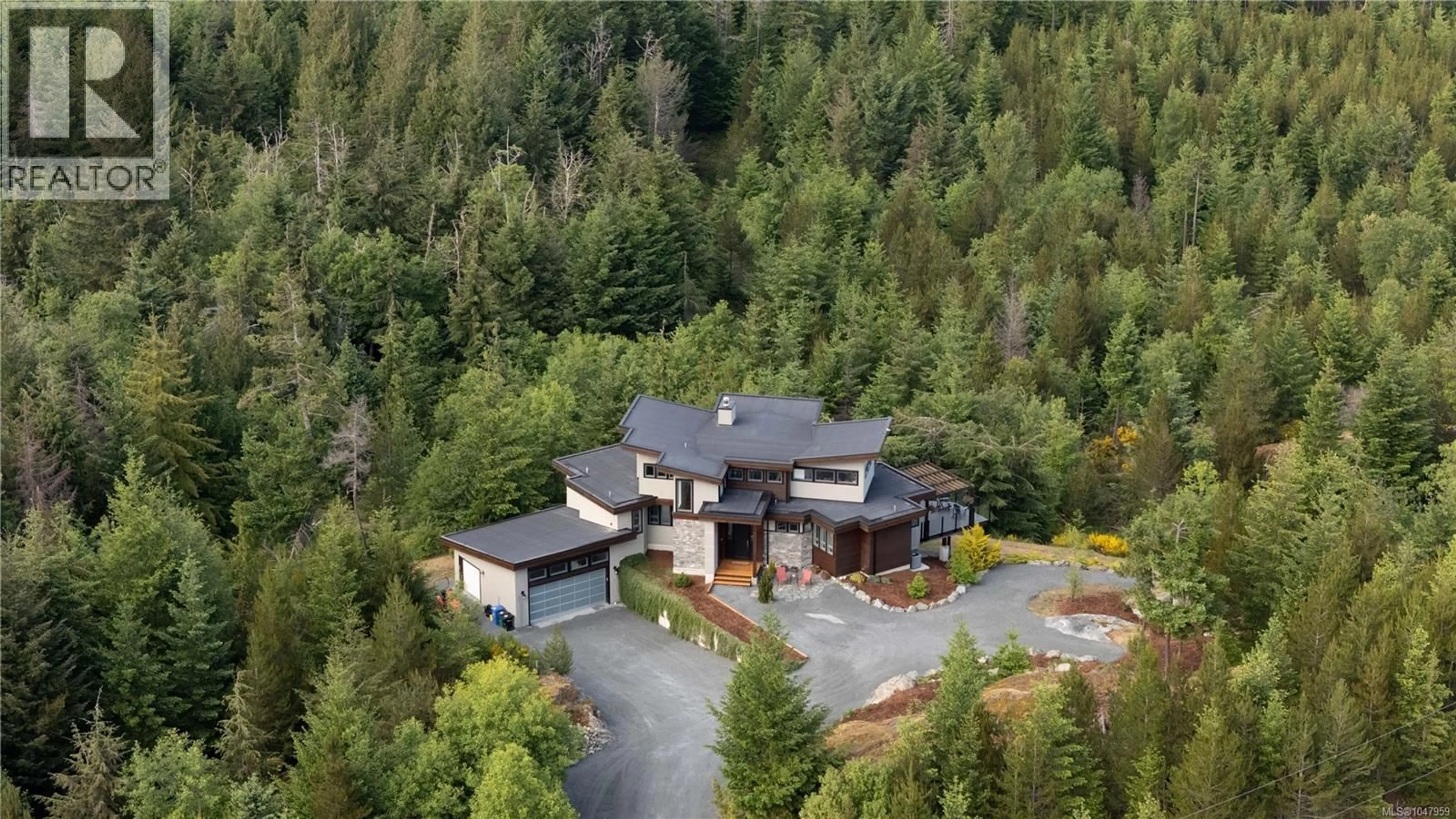 A pic from outside/outdoor area/front of a property/back of a property/a pic from drone, unknown for 1150 STONECREST WAY, Shawnigan Lake British Columbia V8H2J1
