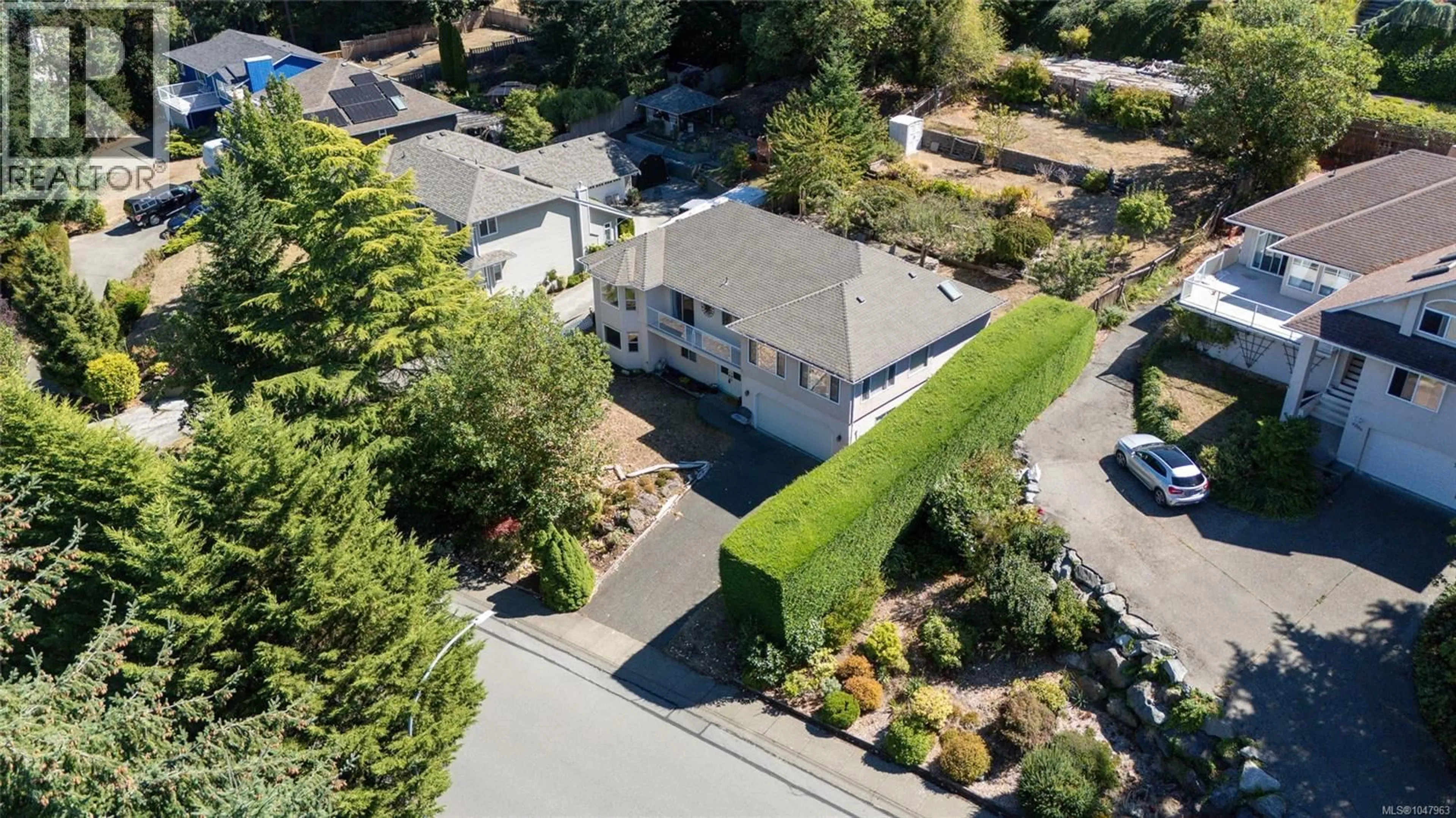 A pic from outside/outdoor area/front of a property/back of a property/a pic from drone, street for 6000 CHIPPEWA ROAD, Duncan British Columbia V9L5P3