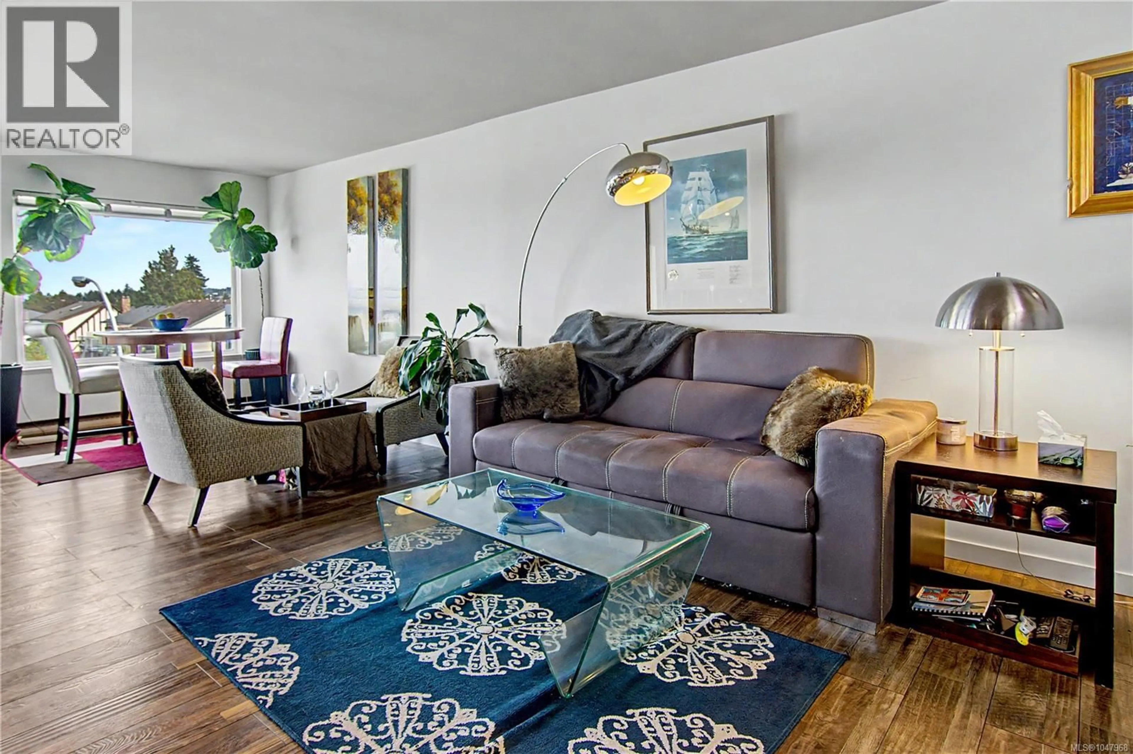 Living room with furniture, unknown for 212A - 6231 BLUEBACK ROAD, Nanaimo British Columbia V9V1J3