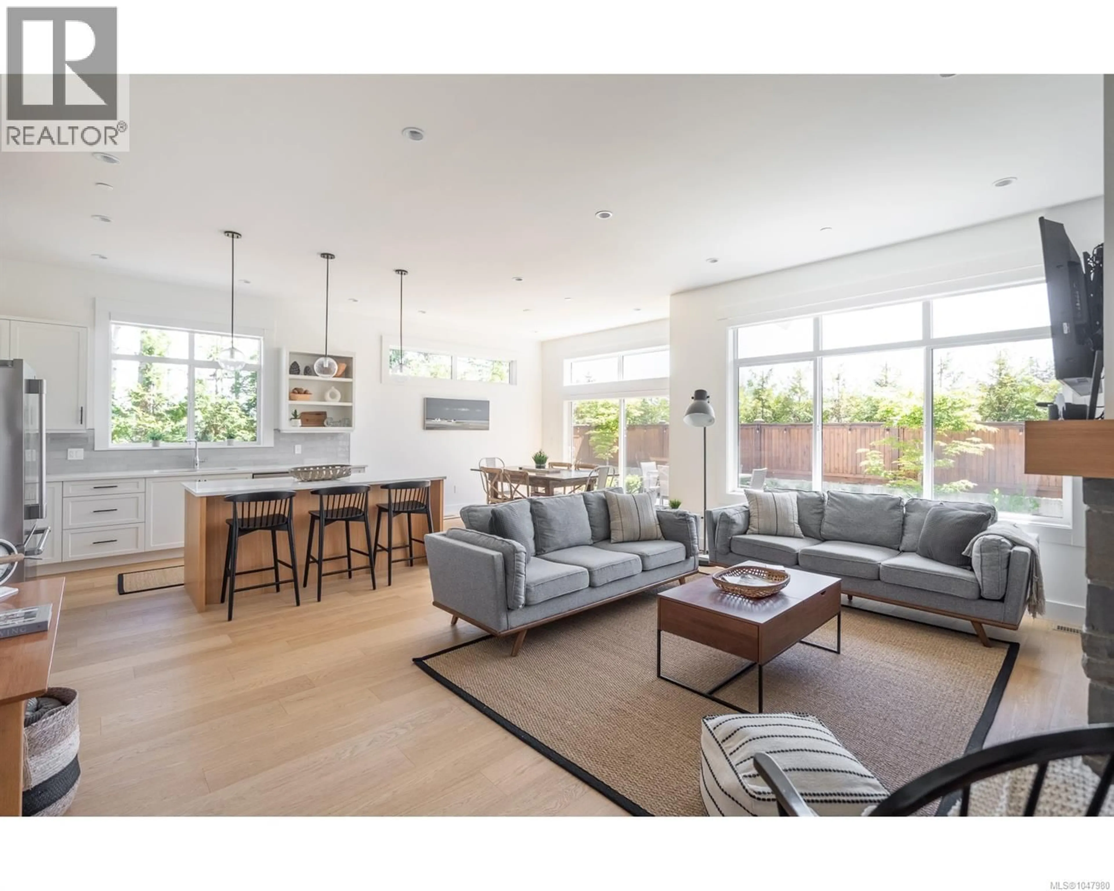 Living room with furniture, wood/laminate floor for 11 - 846 ACKERMAN ROAD, French Creek British Columbia V9P1A7