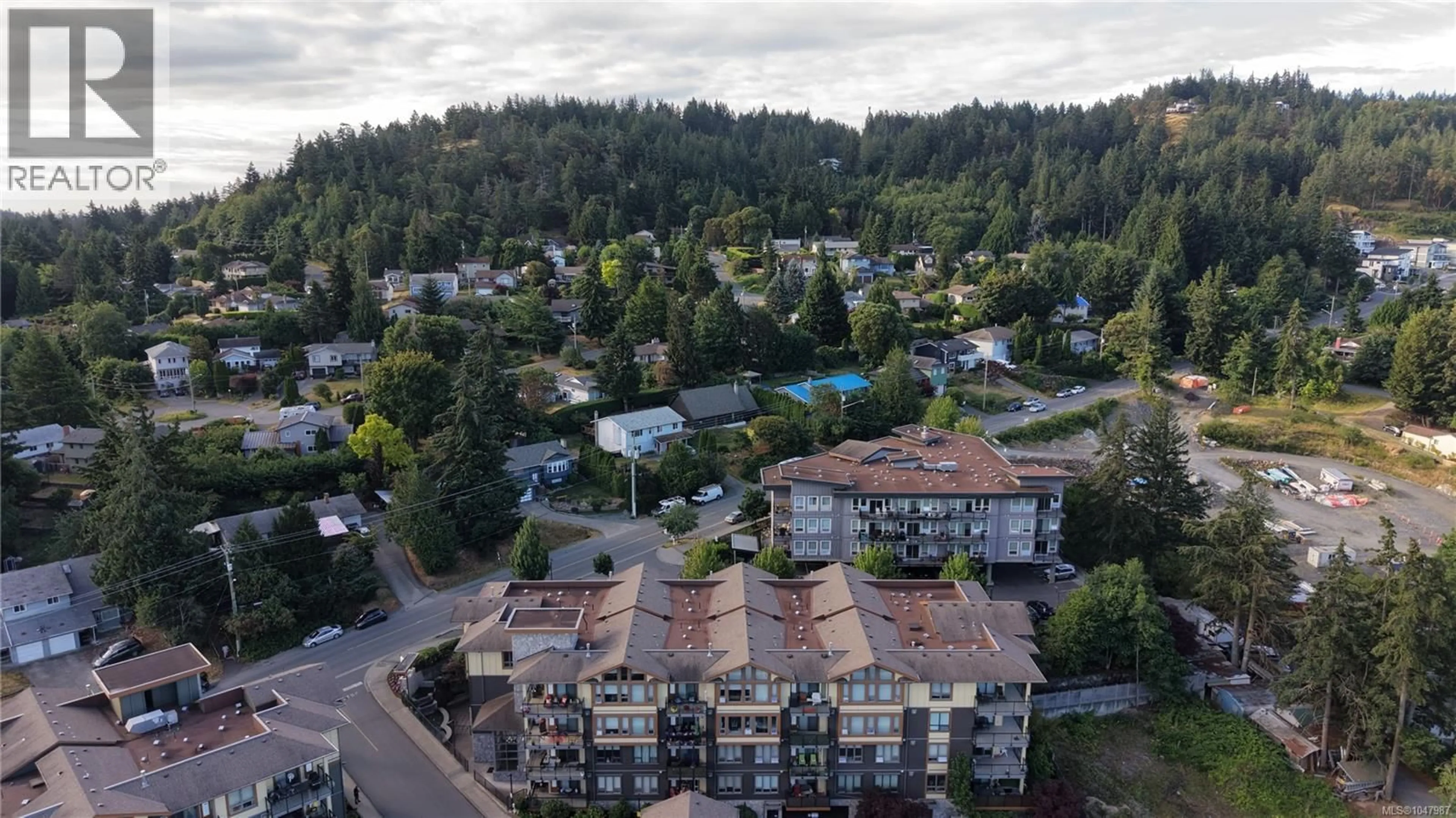 A pic from outside/outdoor area/front of a property/back of a property/a pic from drone, unknown for 401 - 3226 JACKLIN ROAD SOUTHEAST, Langford British Columbia V9B0J5