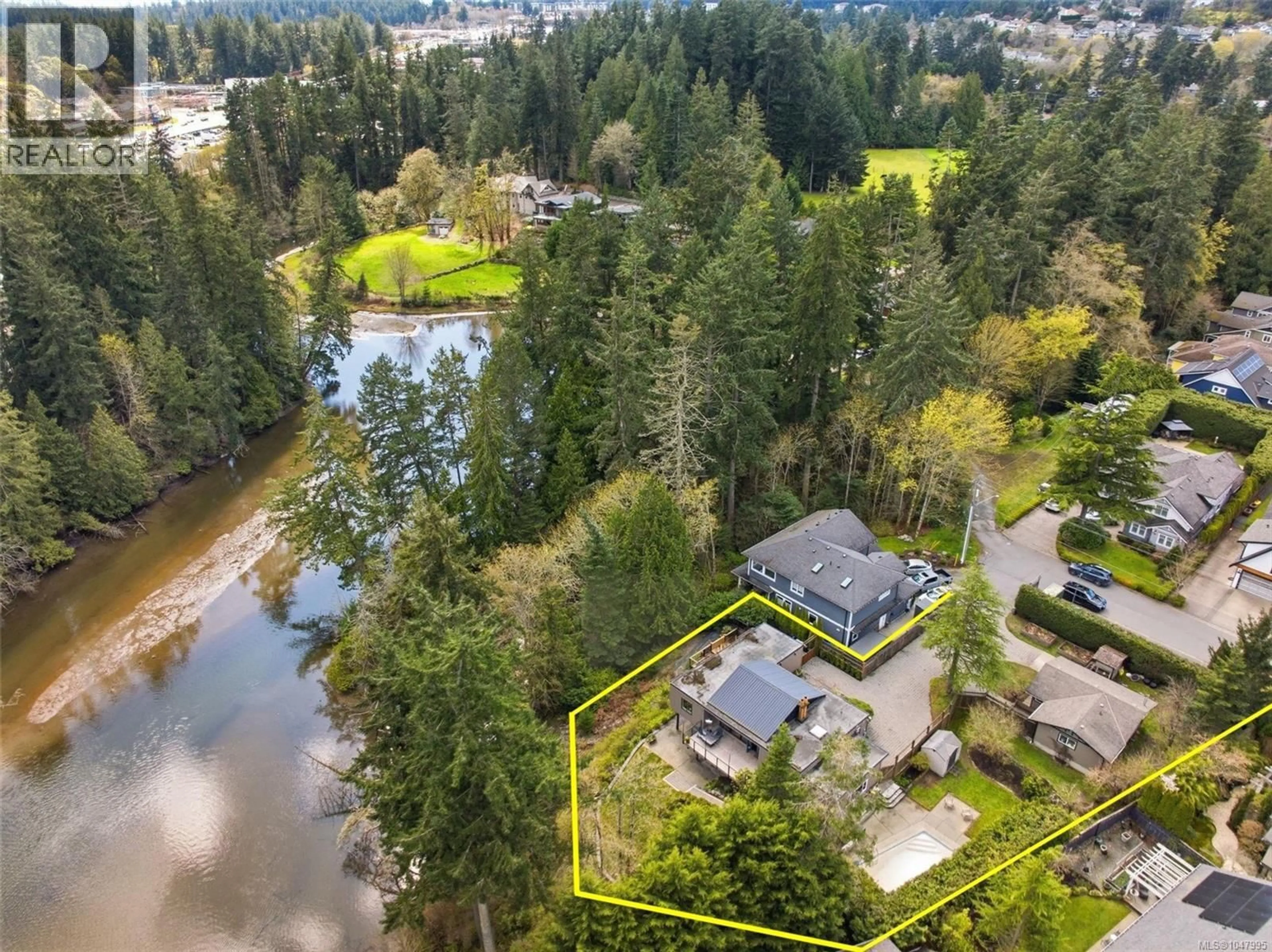 A pic from outside/outdoor area/front of a property/back of a property/a pic from drone, water/lake/river/ocean view for 107 PARSONS ROAD, View Royal British Columbia V9B3J8