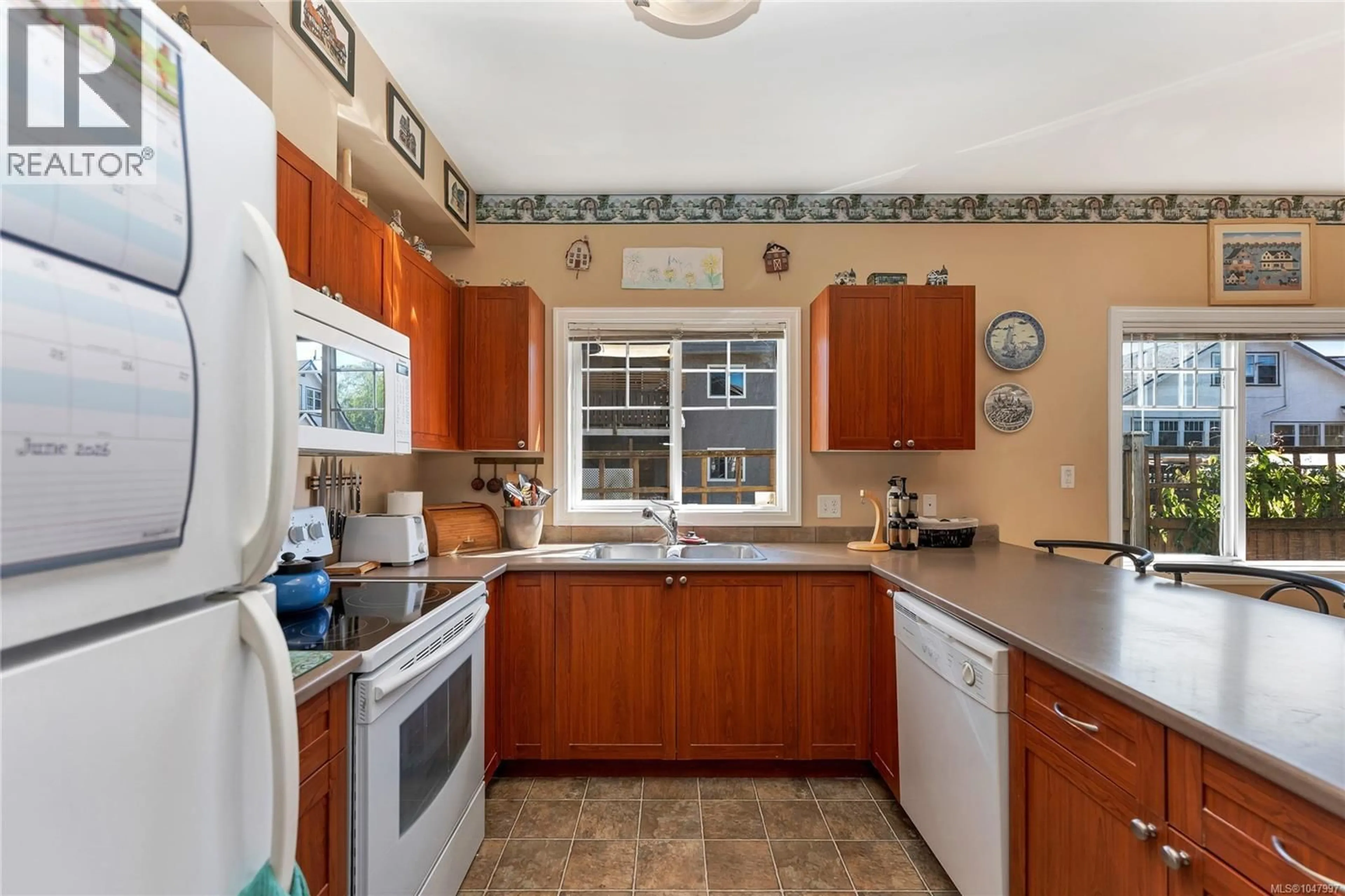 Standard kitchen, ceramic/tile floor for 100 - 2744 MATSON ROAD, Langford British Columbia V9B6W1