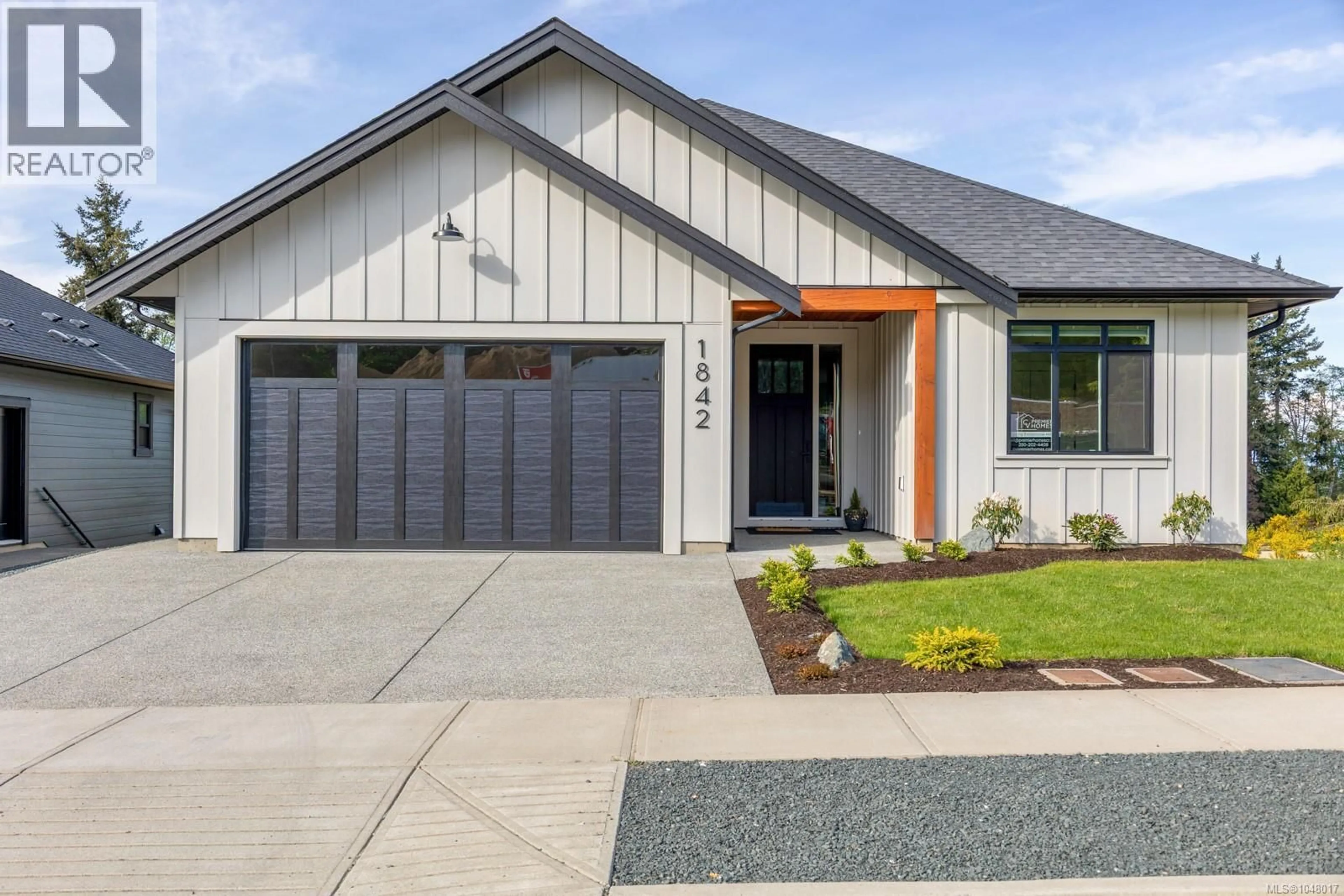Home with brick exterior material, street for 1842 CROWN ISLE BOULEVARD, Courtenay British Columbia V9N9X5