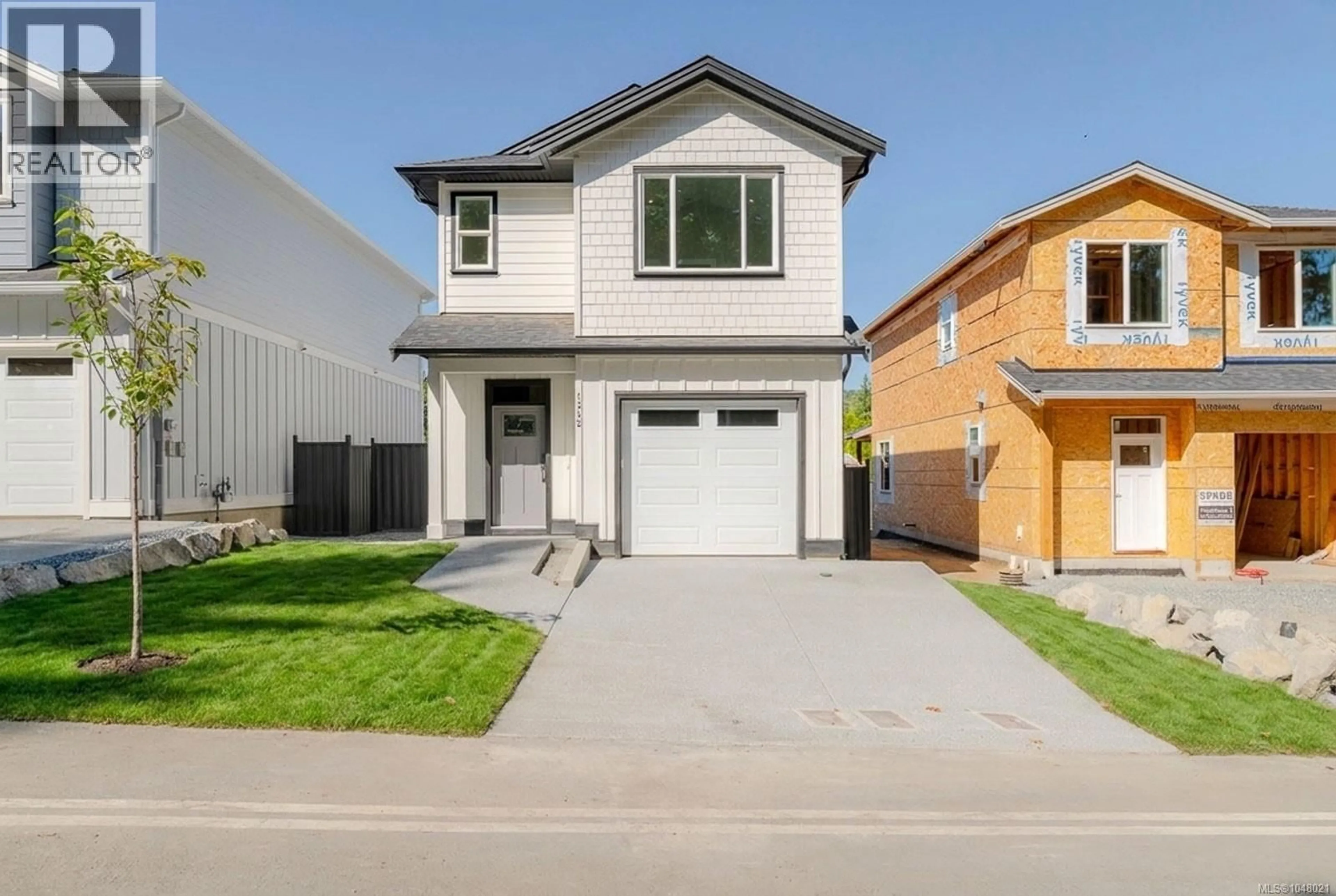 Home with vinyl exterior material, street for 1342 MCKINLEY ROAD, Ladysmith British Columbia V9G1R2