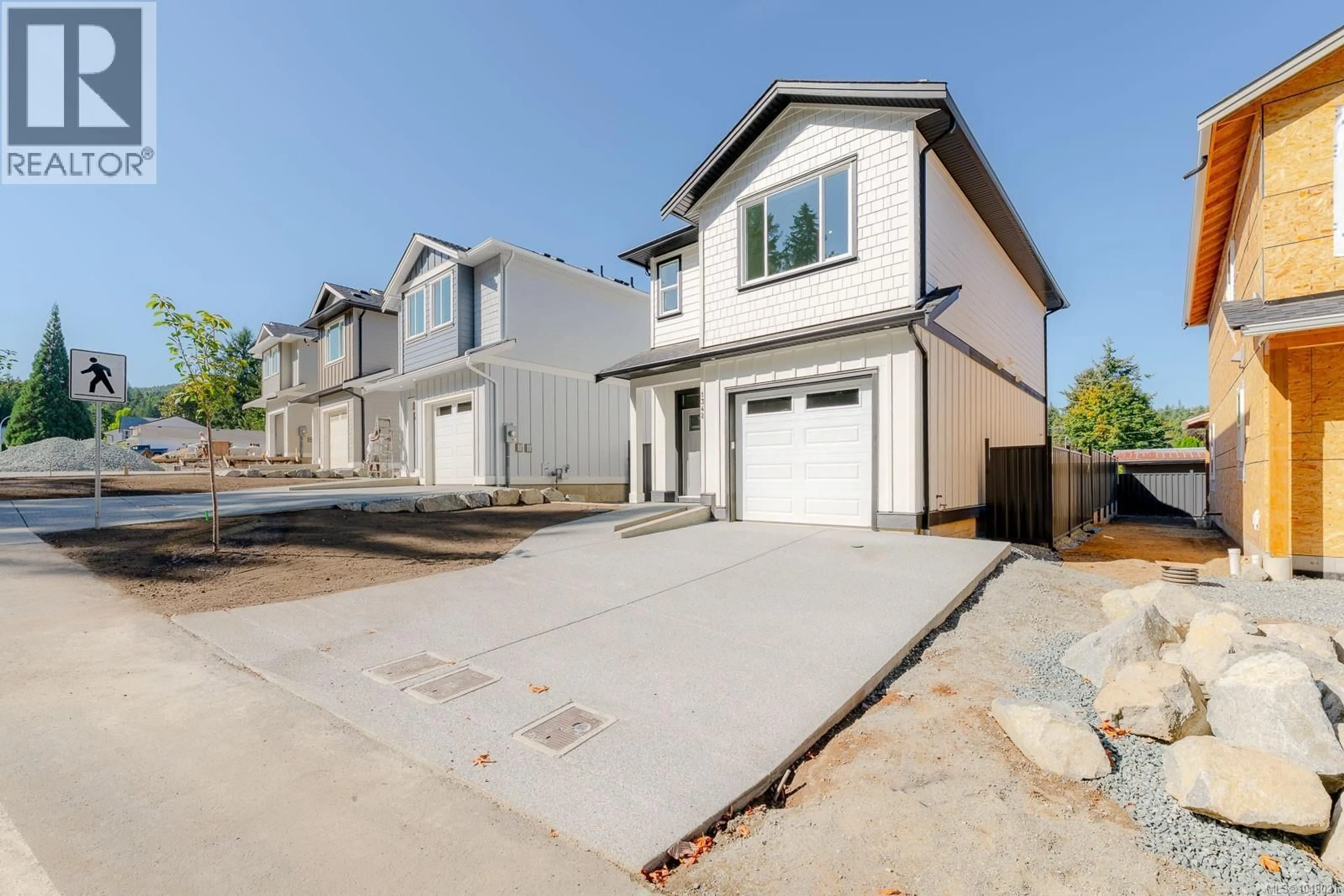 Home with brick exterior material, street for 1342 MCKINLEY ROAD, Ladysmith British Columbia V9G1R2