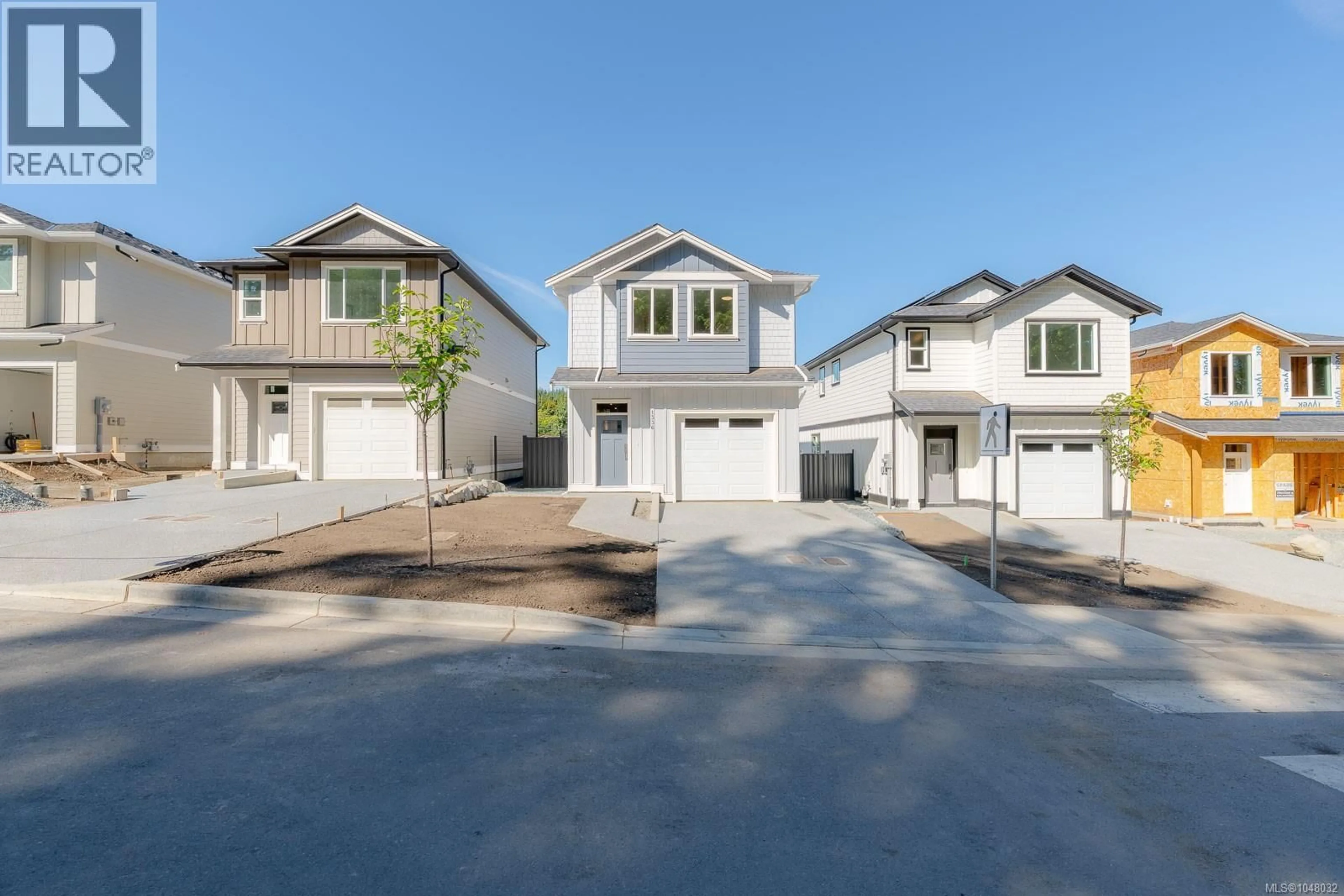Home with vinyl exterior material, street for 1336 MCKINLEY ROAD, Ladysmith British Columbia V9G1R2