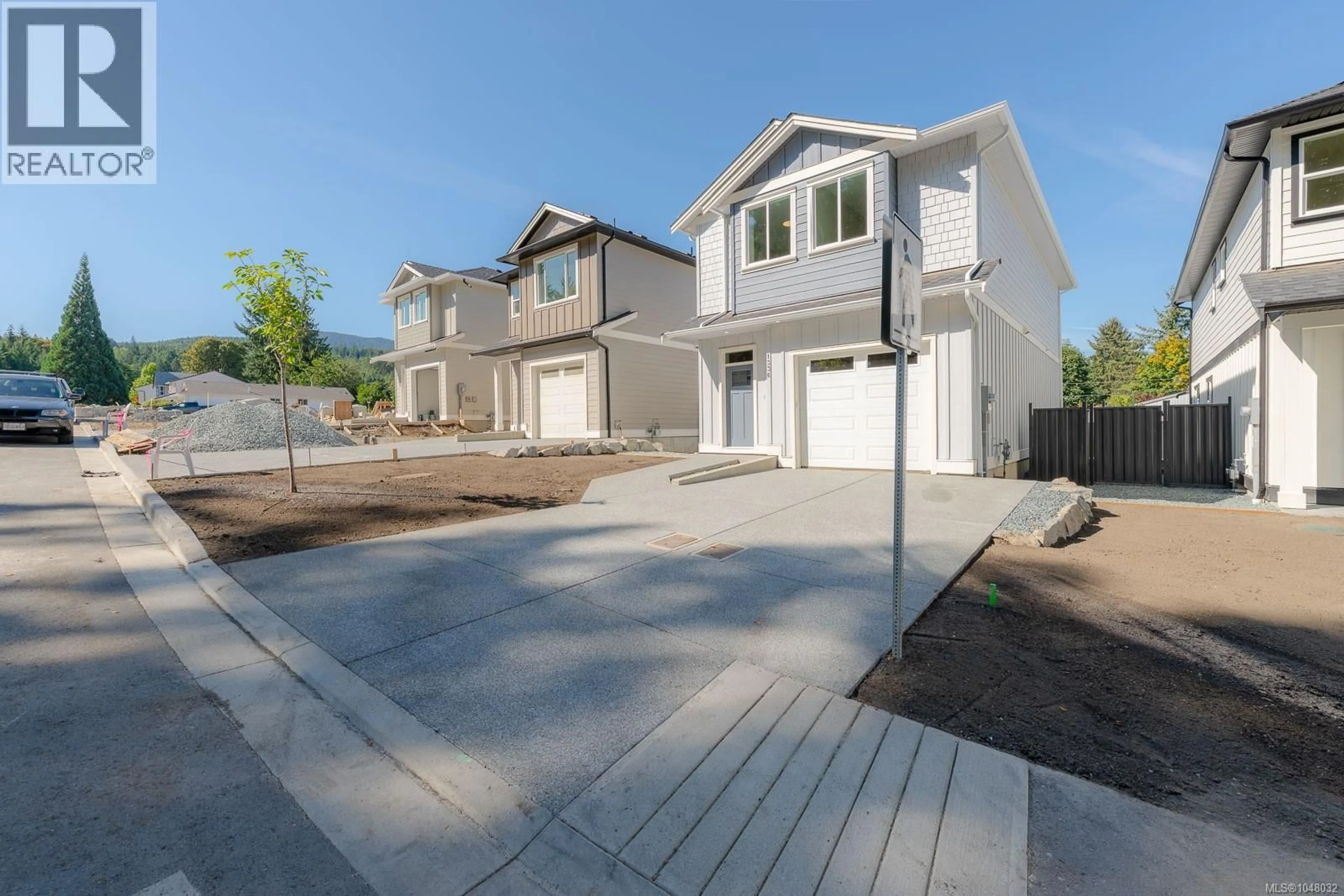 Home with vinyl exterior material, street for 1336 MCKINLEY ROAD, Ladysmith British Columbia V9G1R2