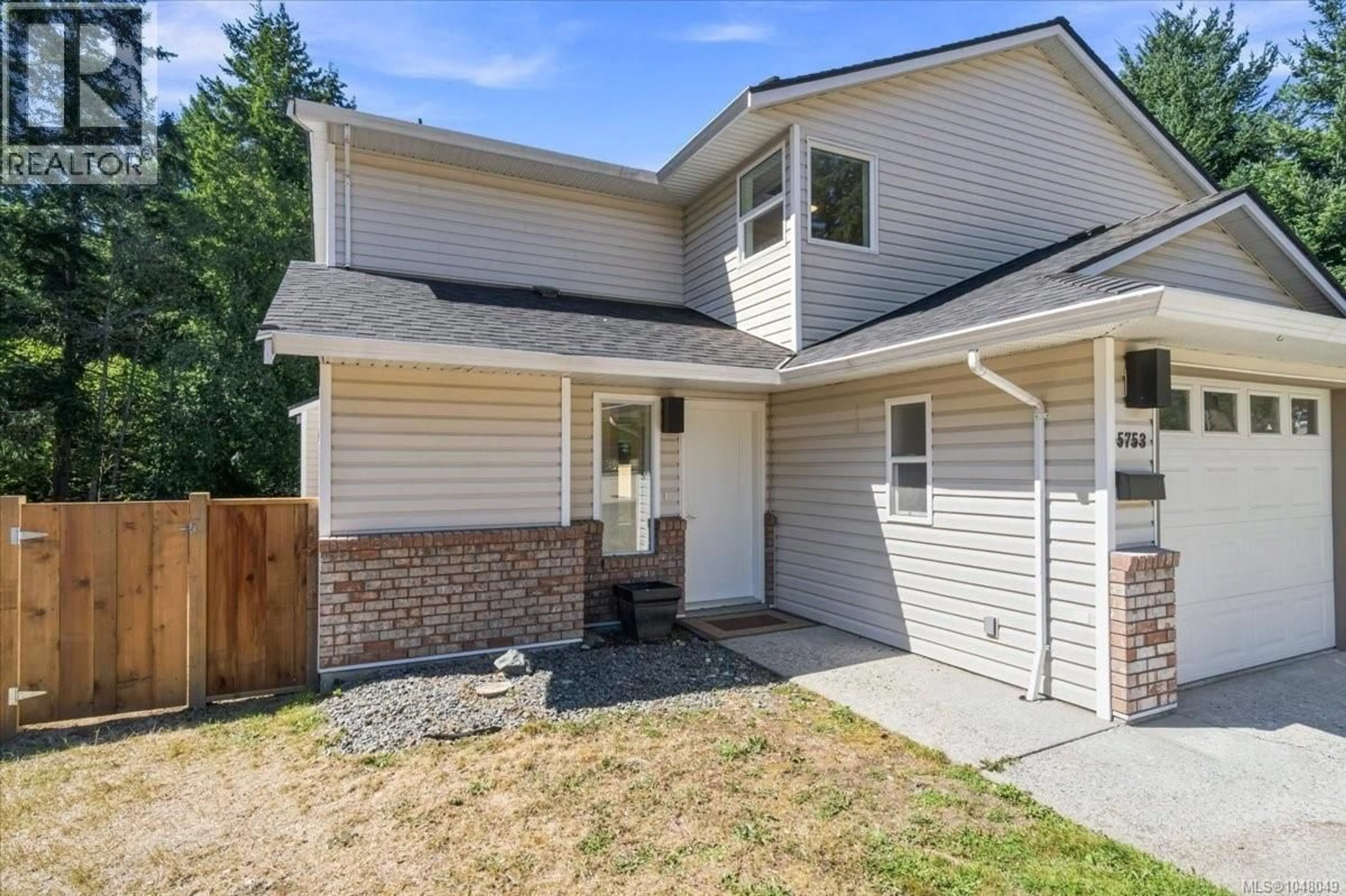 Home with vinyl exterior material, street for 5753 METRAL DRIVE, Nanaimo British Columbia V9T2L5