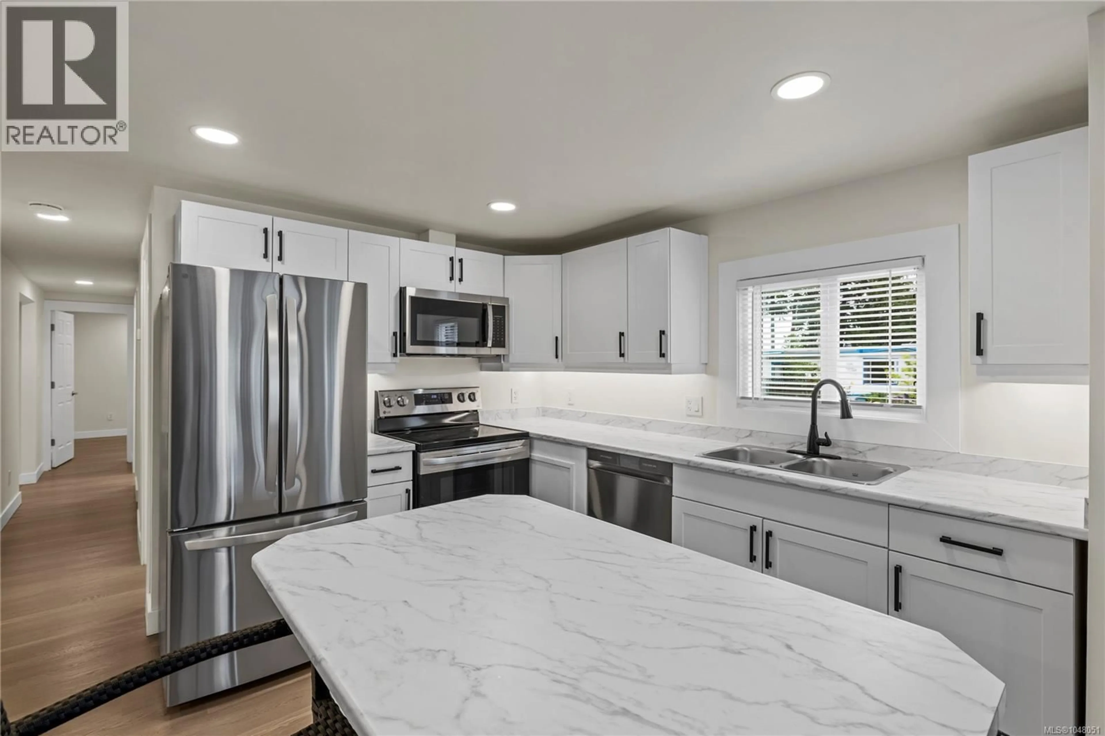 Open concept kitchen, ceramic/tile floor for 66 - 1247 ARBUTUS ROAD, Parksville British Columbia V9P1R3