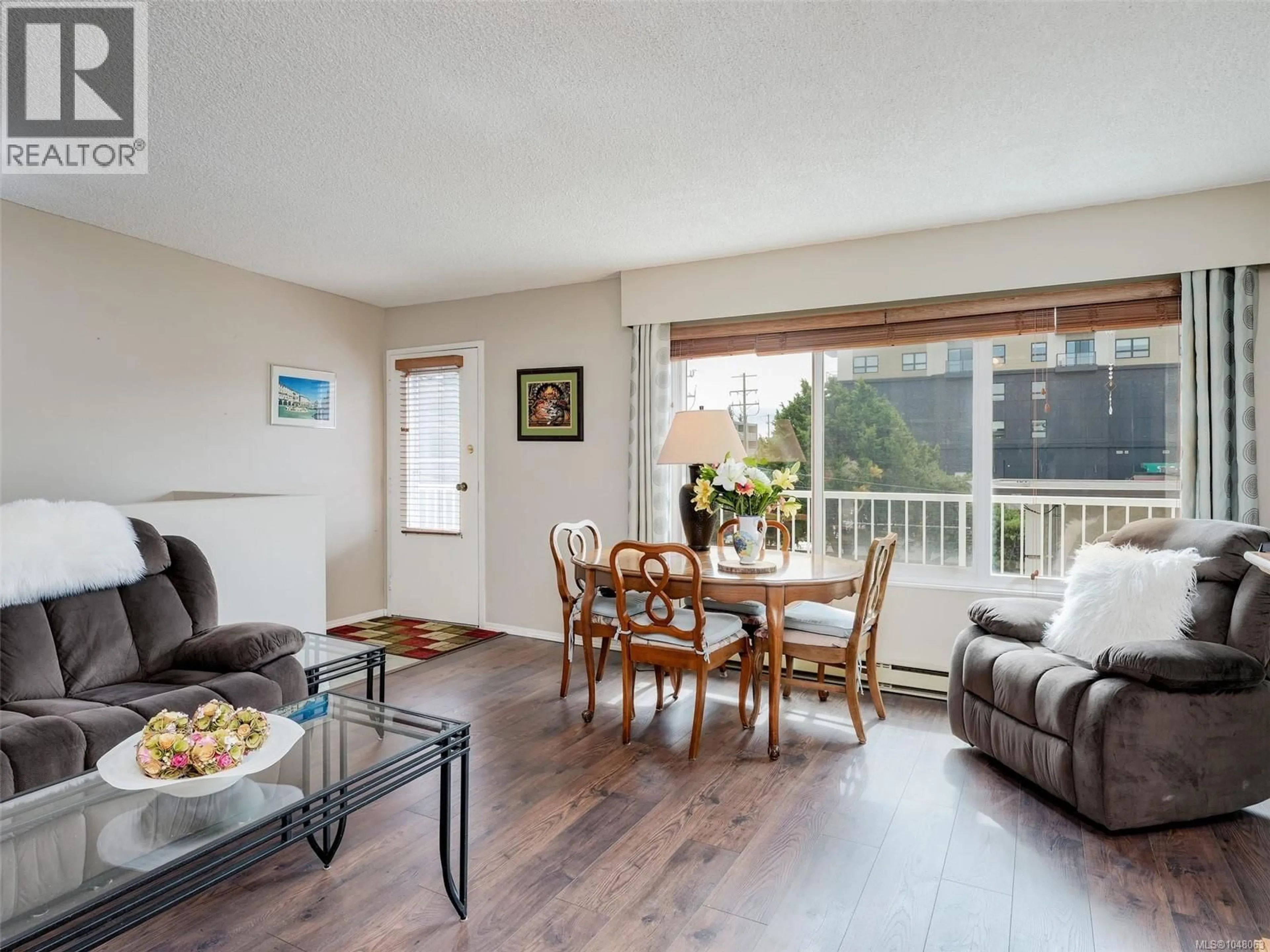 Living room with furniture, wood/laminate floor for 303 - 642 ADMIRALS ROAD, Esquimalt British Columbia V9A2N7
