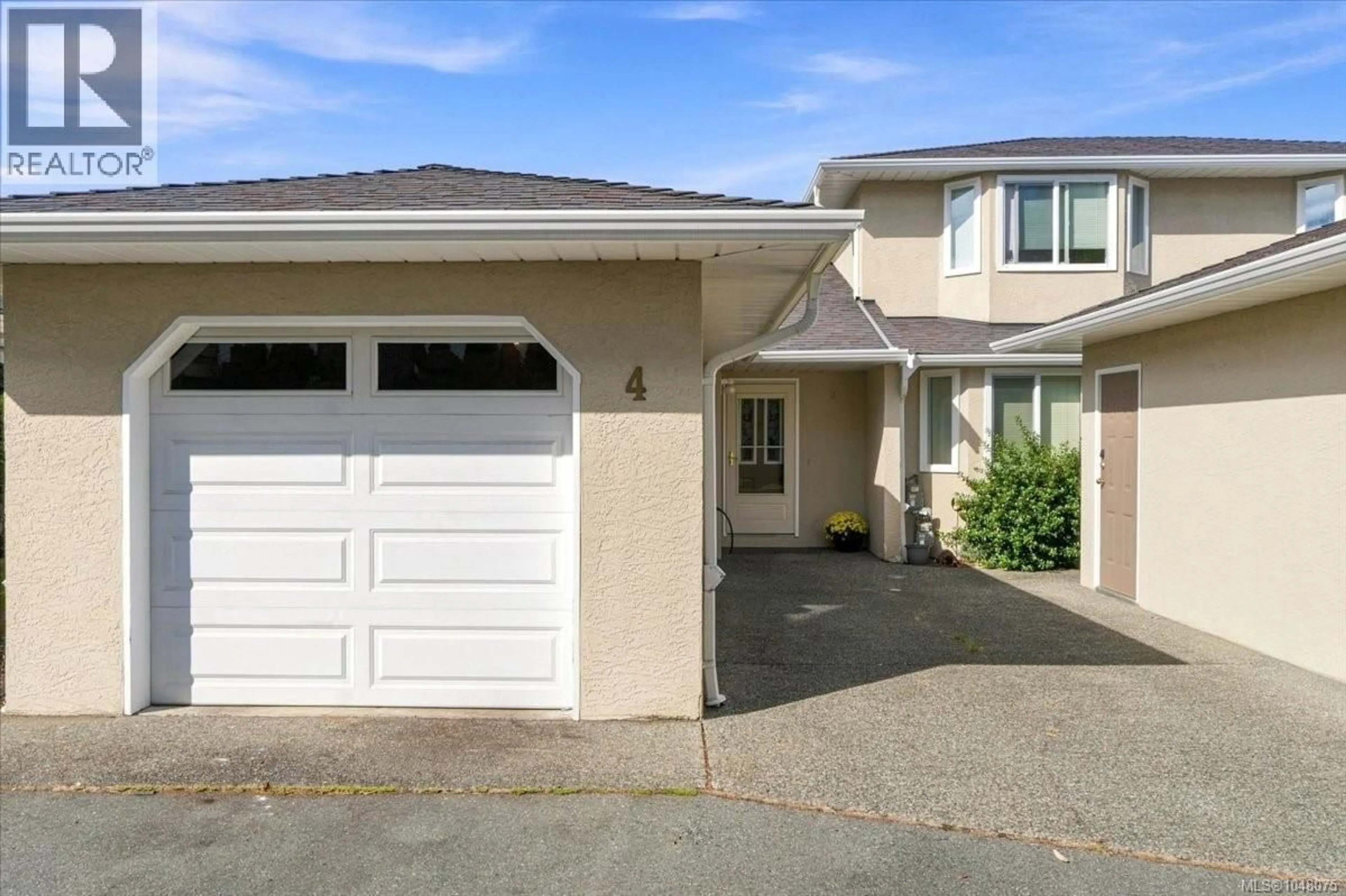 Home with vinyl exterior material, street for 4 - 6211 BLUEBACK ROAD, Nanaimo British Columbia V9V1M8