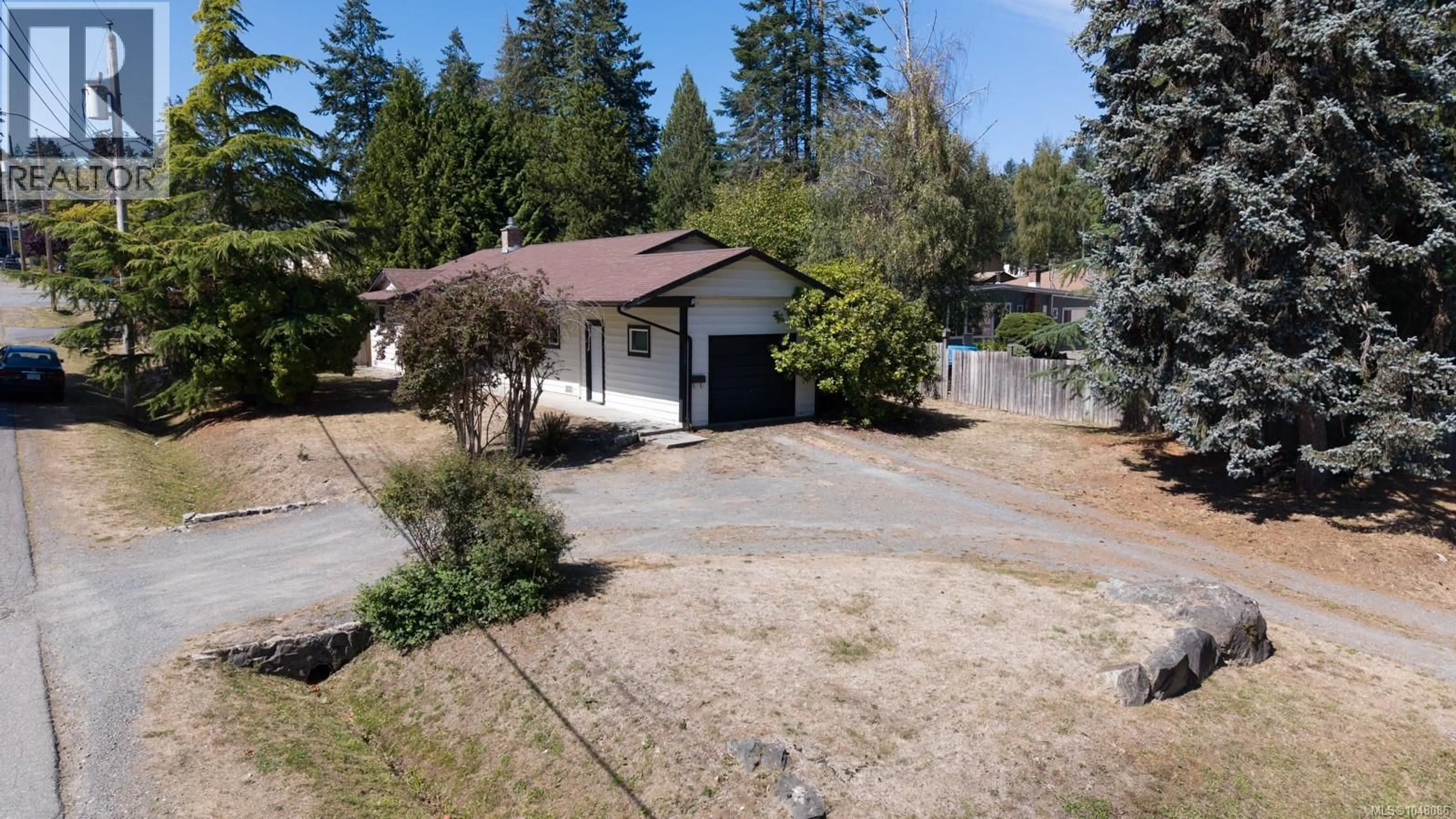 A pic from outside/outdoor area/front of a property/back of a property/a pic from drone, street for 3161 SINGLETON ROAD, Nanaimo British Columbia V9T2X4