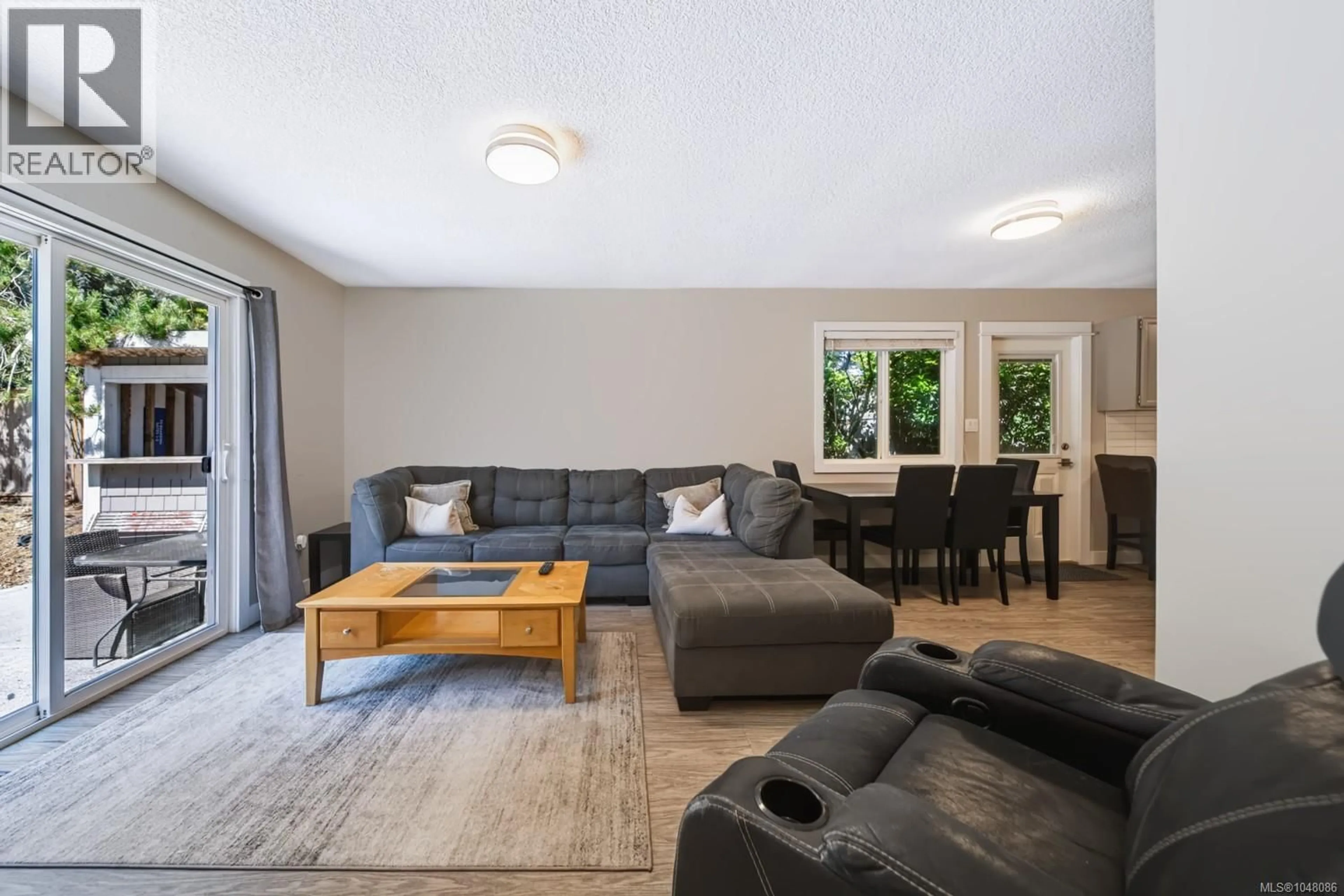 Living room with furniture, wood/laminate floor for 3161 SINGLETON ROAD, Nanaimo British Columbia V9T2X4