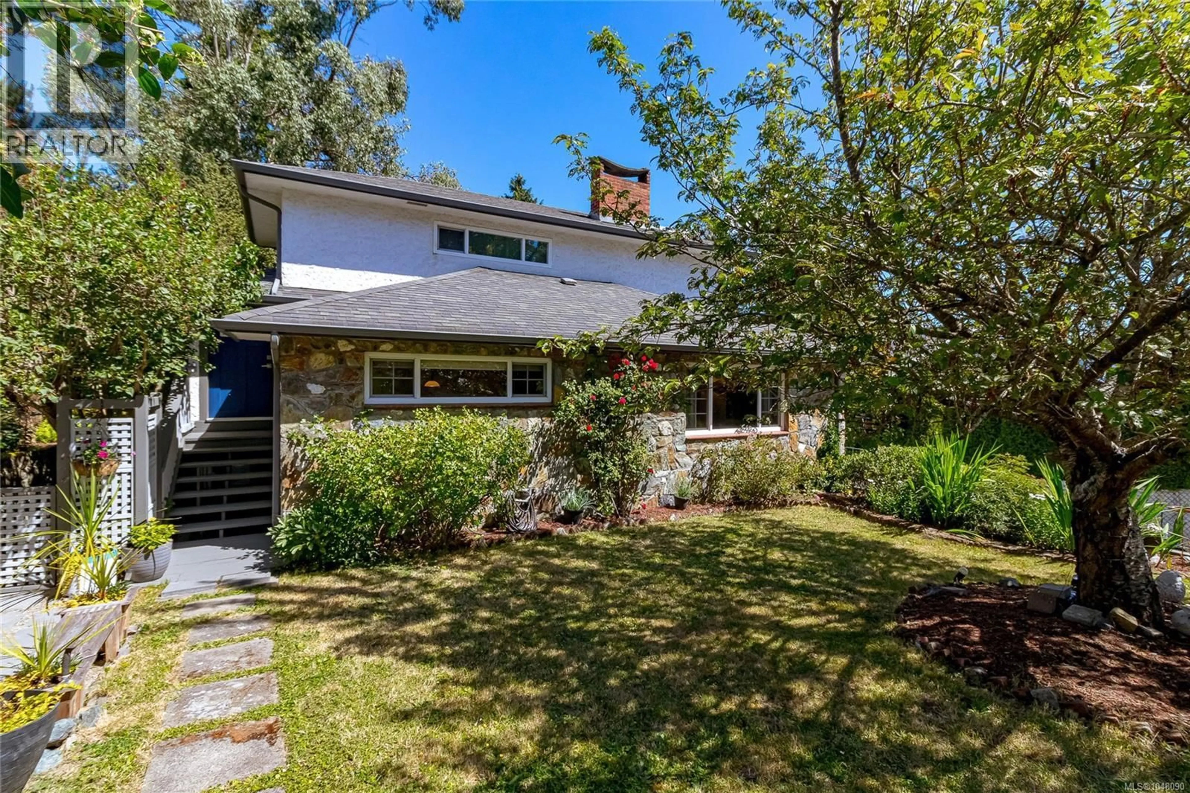 A pic from outside/outdoor area/front of a property/back of a property/a pic from drone, street for 610 KENT ROAD, Saanich British Columbia V8Z1Z1