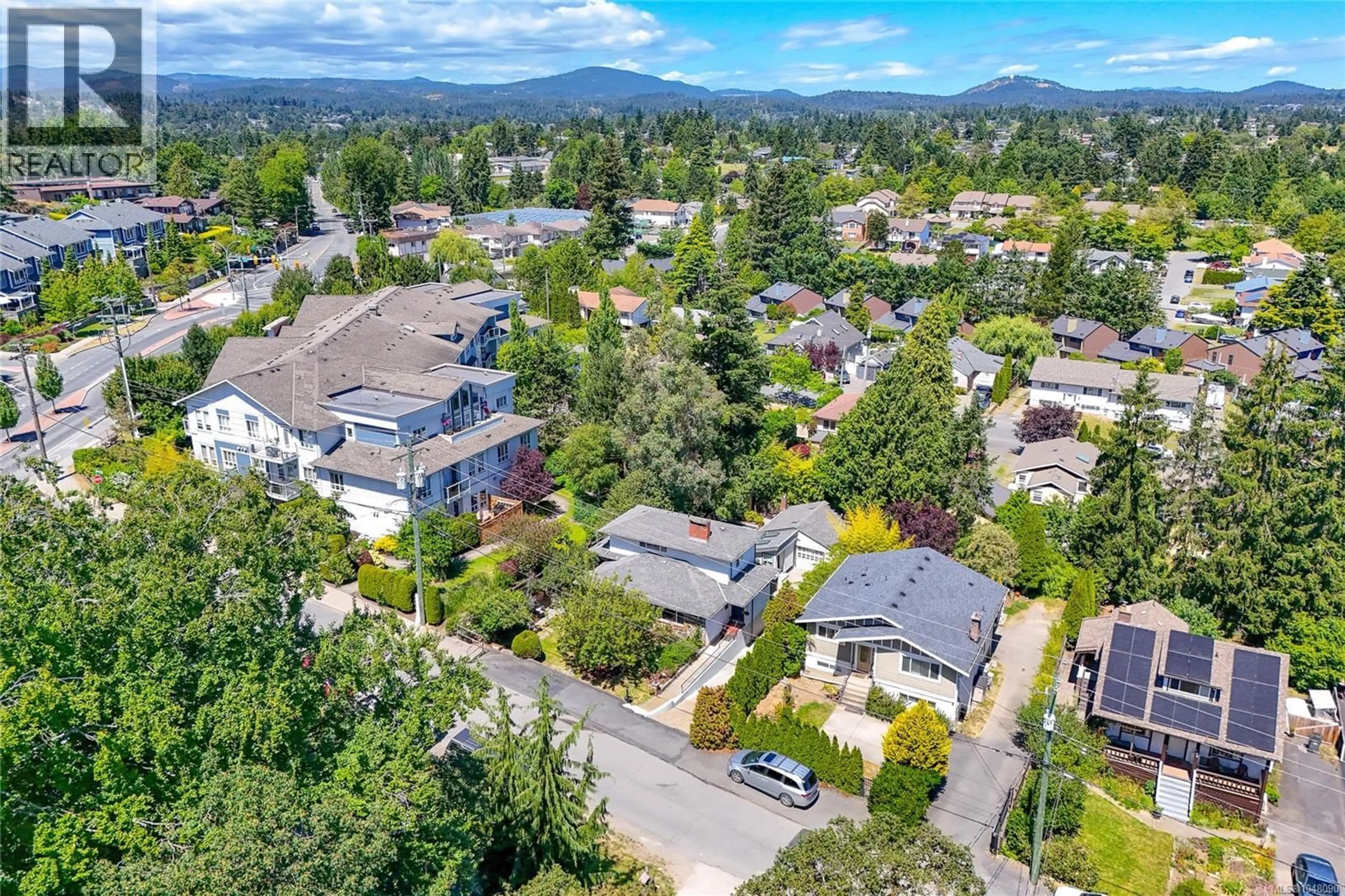 A pic from outside/outdoor area/front of a property/back of a property/a pic from drone, mountain view for 610 KENT ROAD, Saanich British Columbia V8Z1Z1
