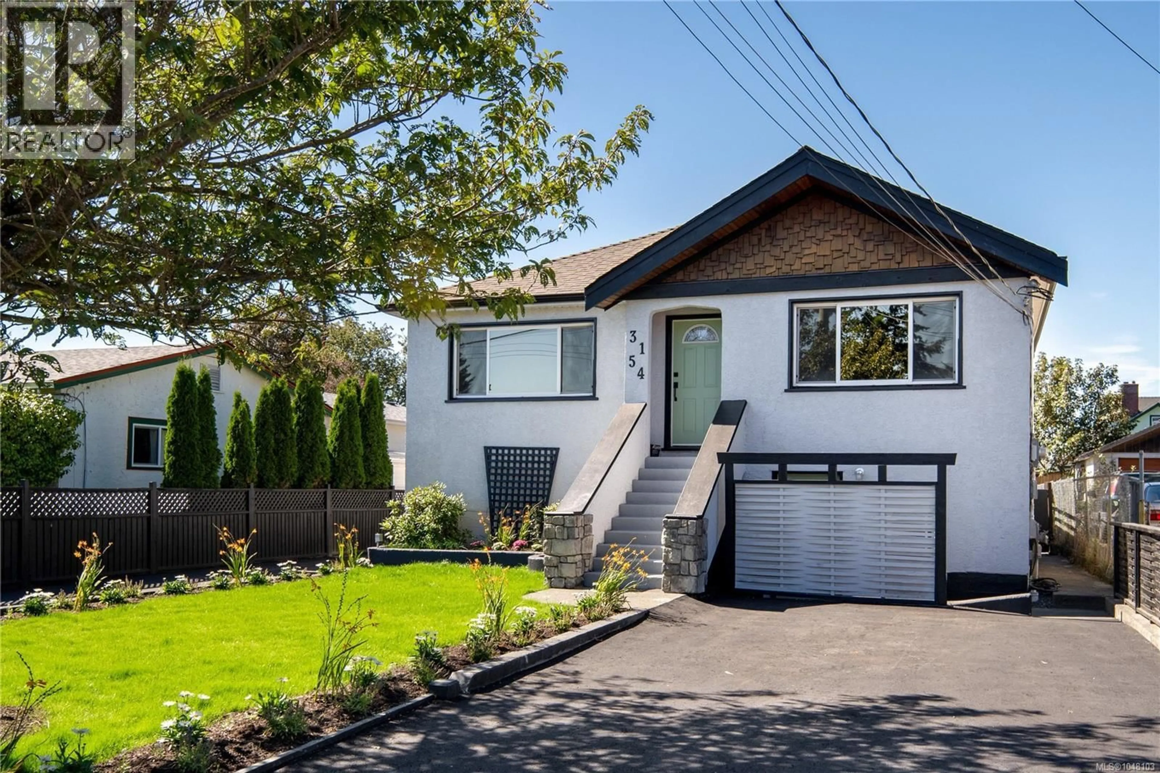 Home with vinyl exterior material, street for 3154 MILLGROVE STREET, Saanich British Columbia V9A1X6