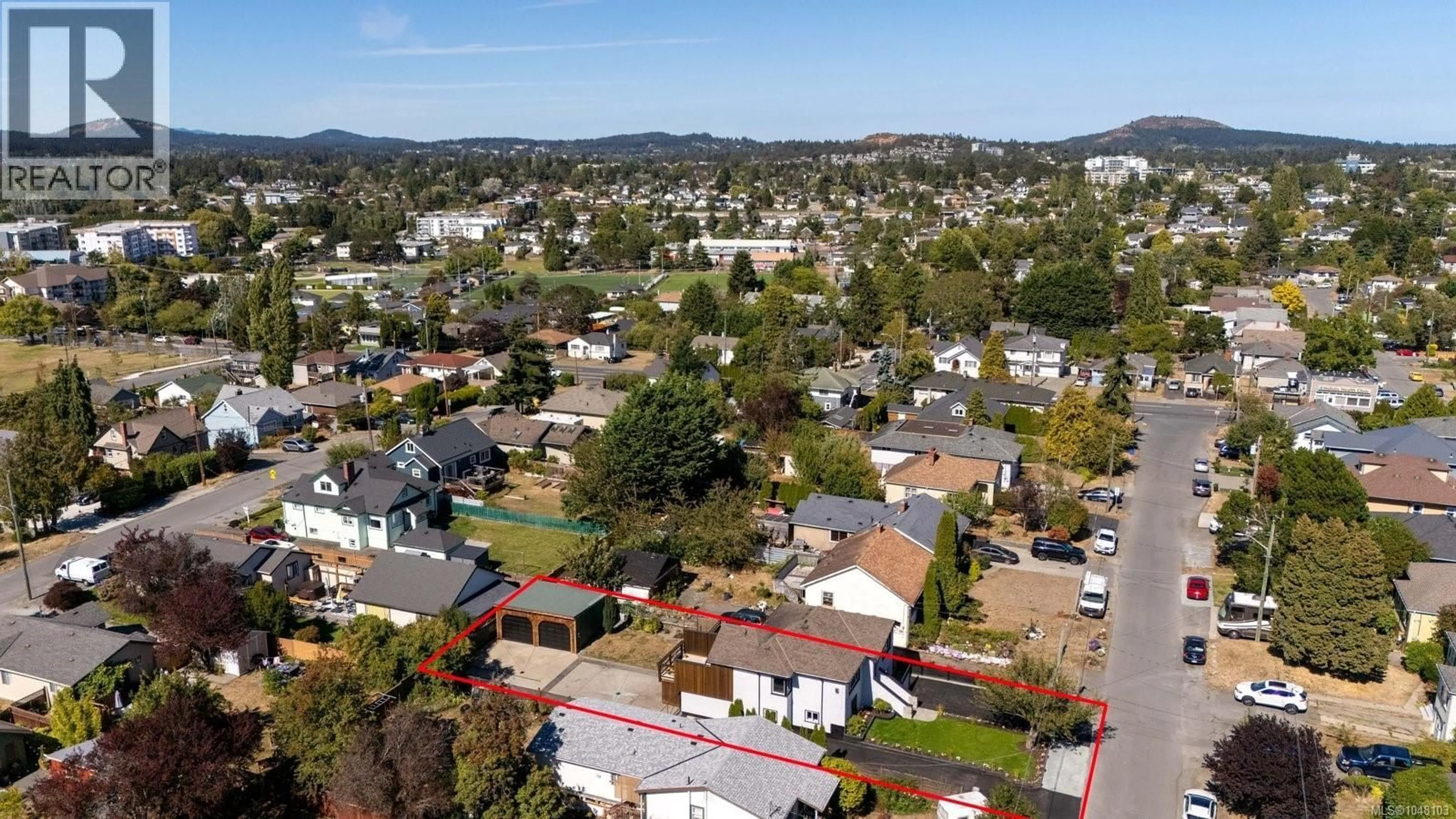 A pic from outside/outdoor area/front of a property/back of a property/a pic from drone, mountain view for 3154 MILLGROVE STREET, Saanich British Columbia V9A1X6