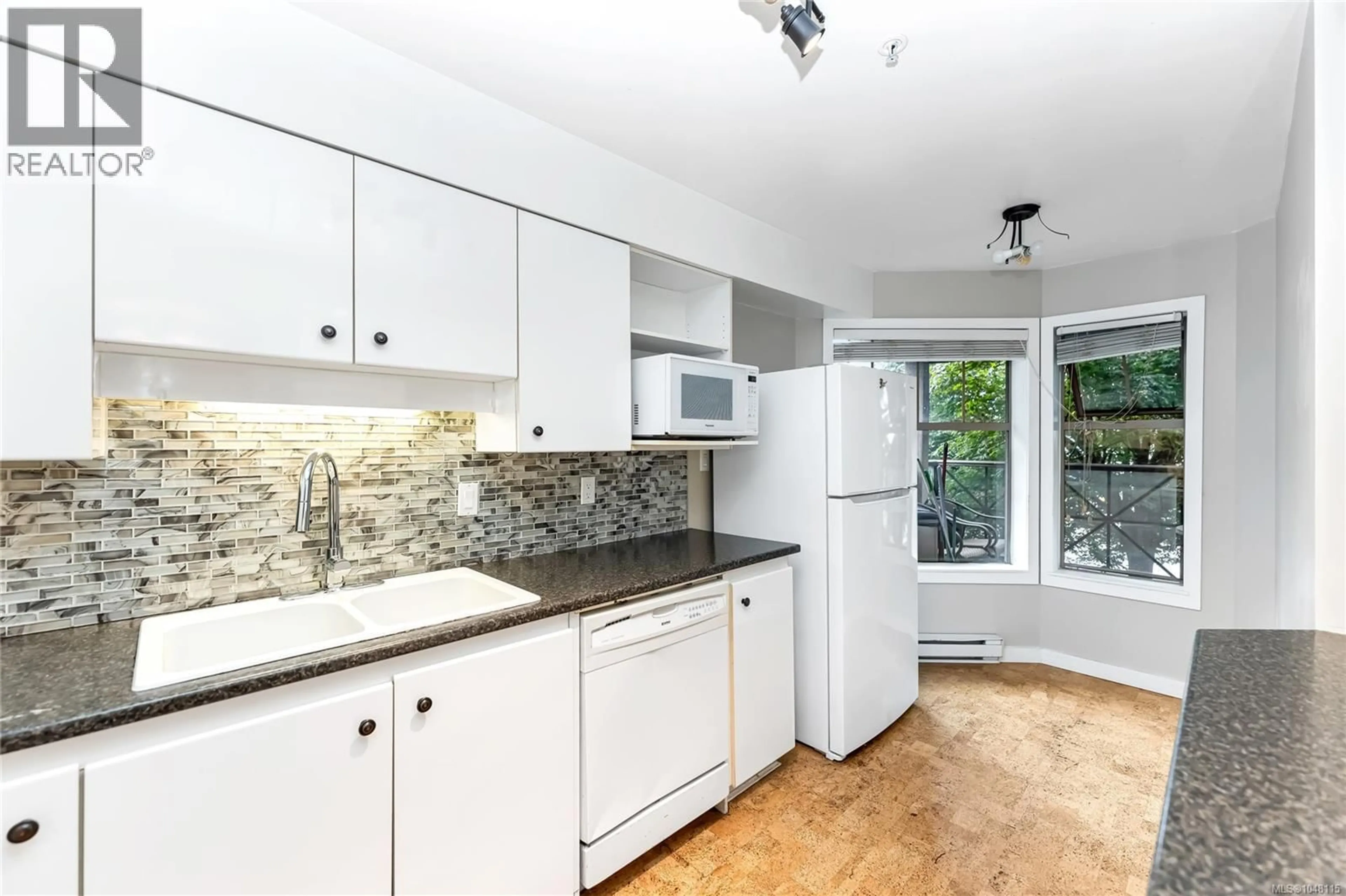 Standard kitchen, ceramic/tile floor for 209 - 935 JOHNSON STREET, Victoria British Columbia V8V3N5