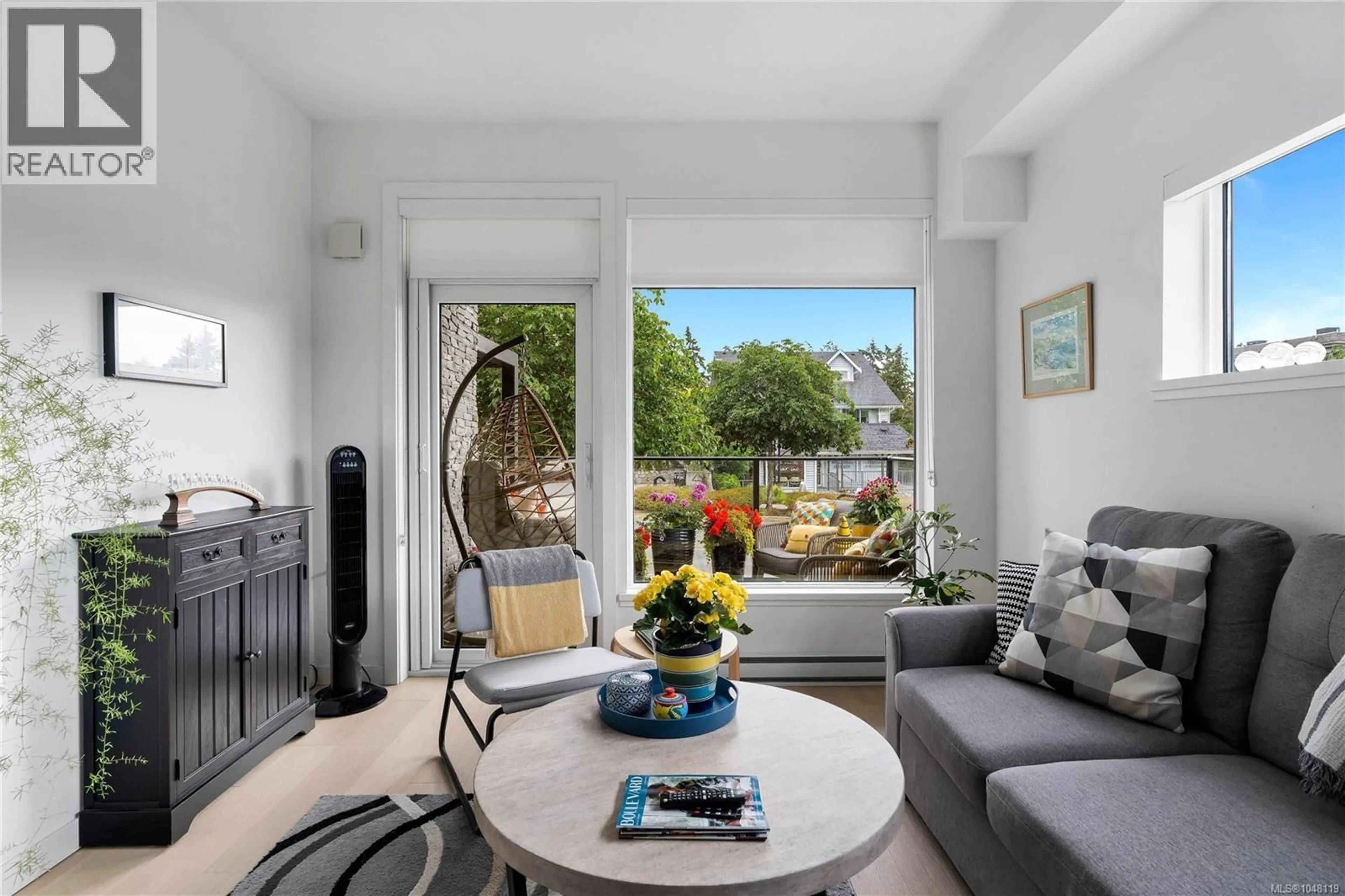 Living room with furniture, unknown for 201 - 7162 WEST SAANICH ROAD, Central Saanich British Columbia V8M1P6