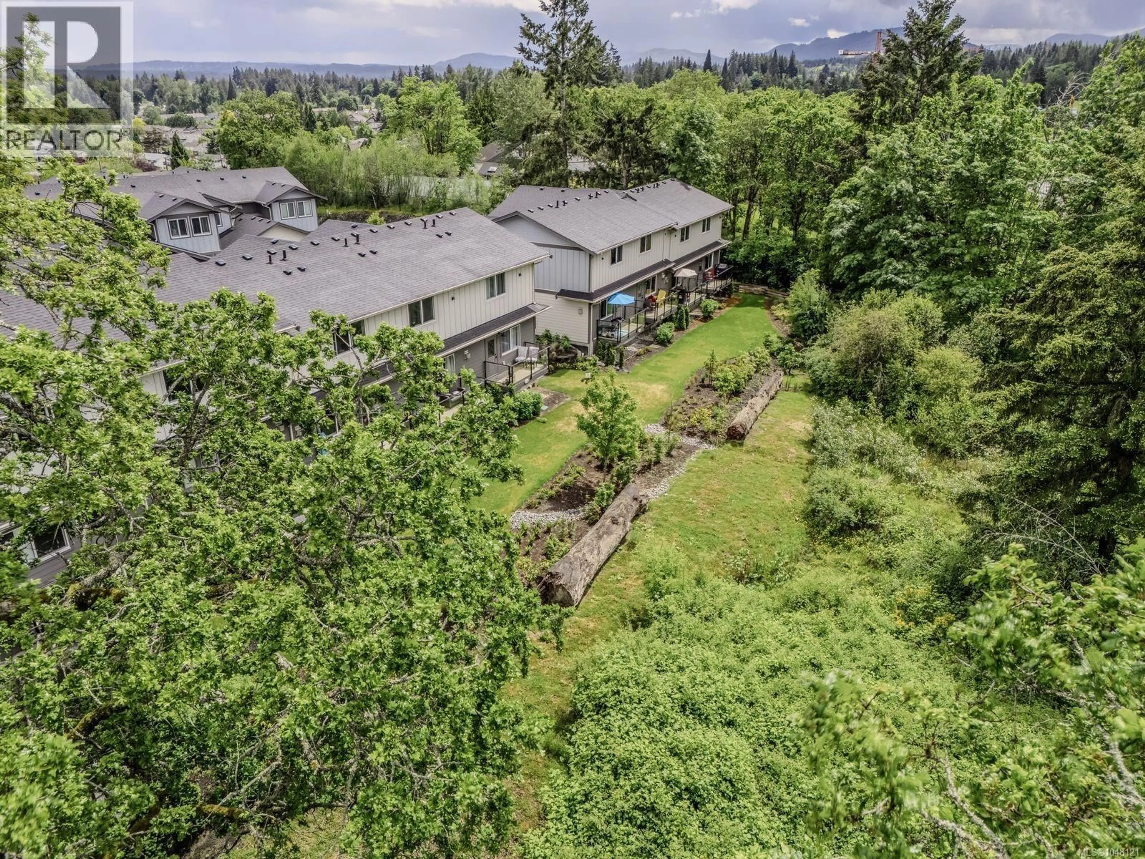 A pic from outside/outdoor area/front of a property/back of a property/a pic from drone, mountain view for 35 - 3195 HERONS WAY, Duncan British Columbia V9L0H8