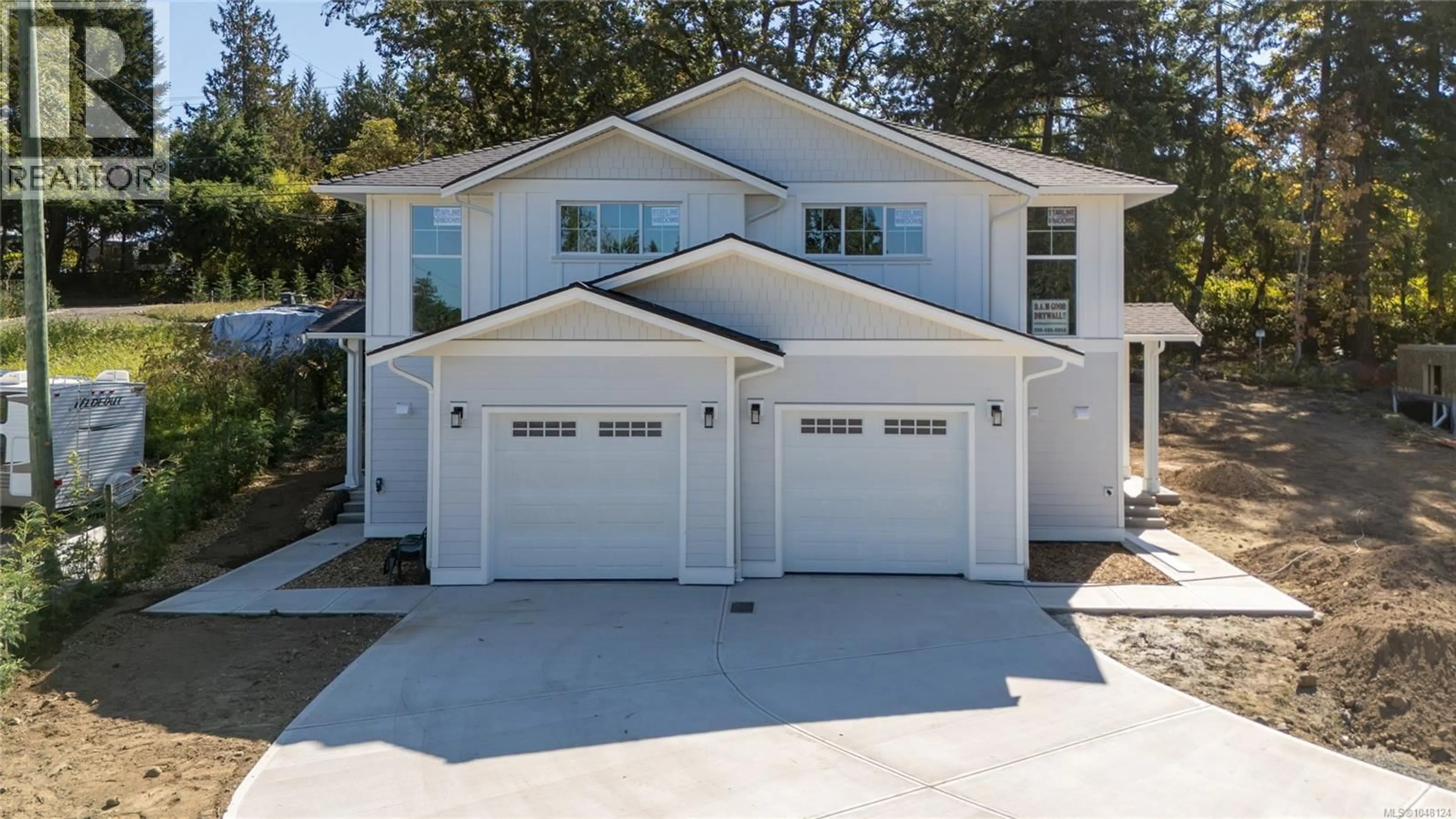 Home with vinyl exterior material, street for 1986 ANDEMERE WAY, Duncan British Columbia V9L5M1