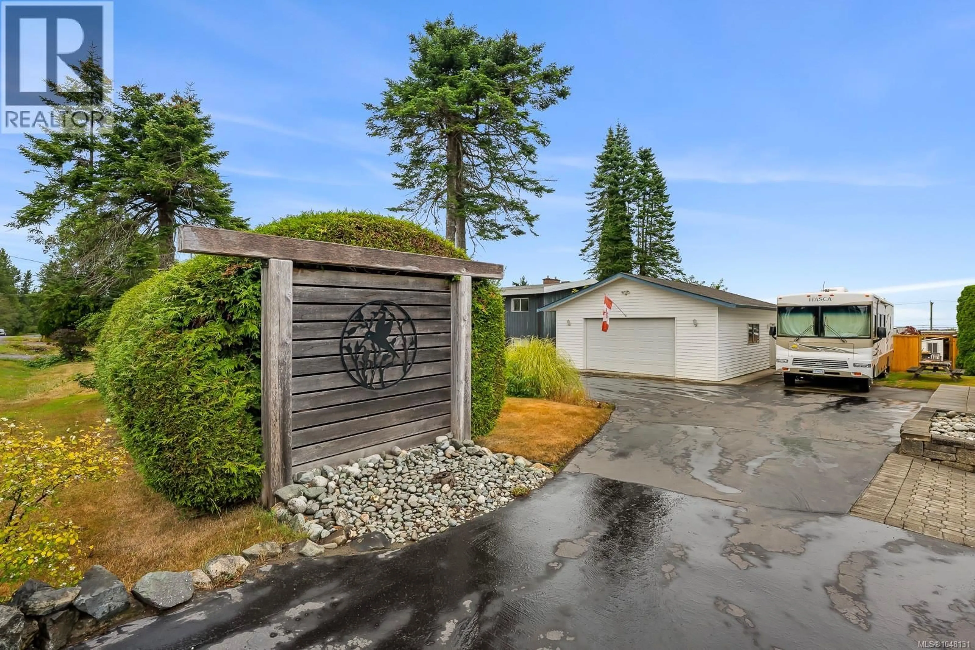 A pic from outside/outdoor area/front of a property/back of a property/a pic from drone, water/lake/river/ocean view for 3980 DILLMAN ROAD, Campbell River British Columbia V9H1G9
