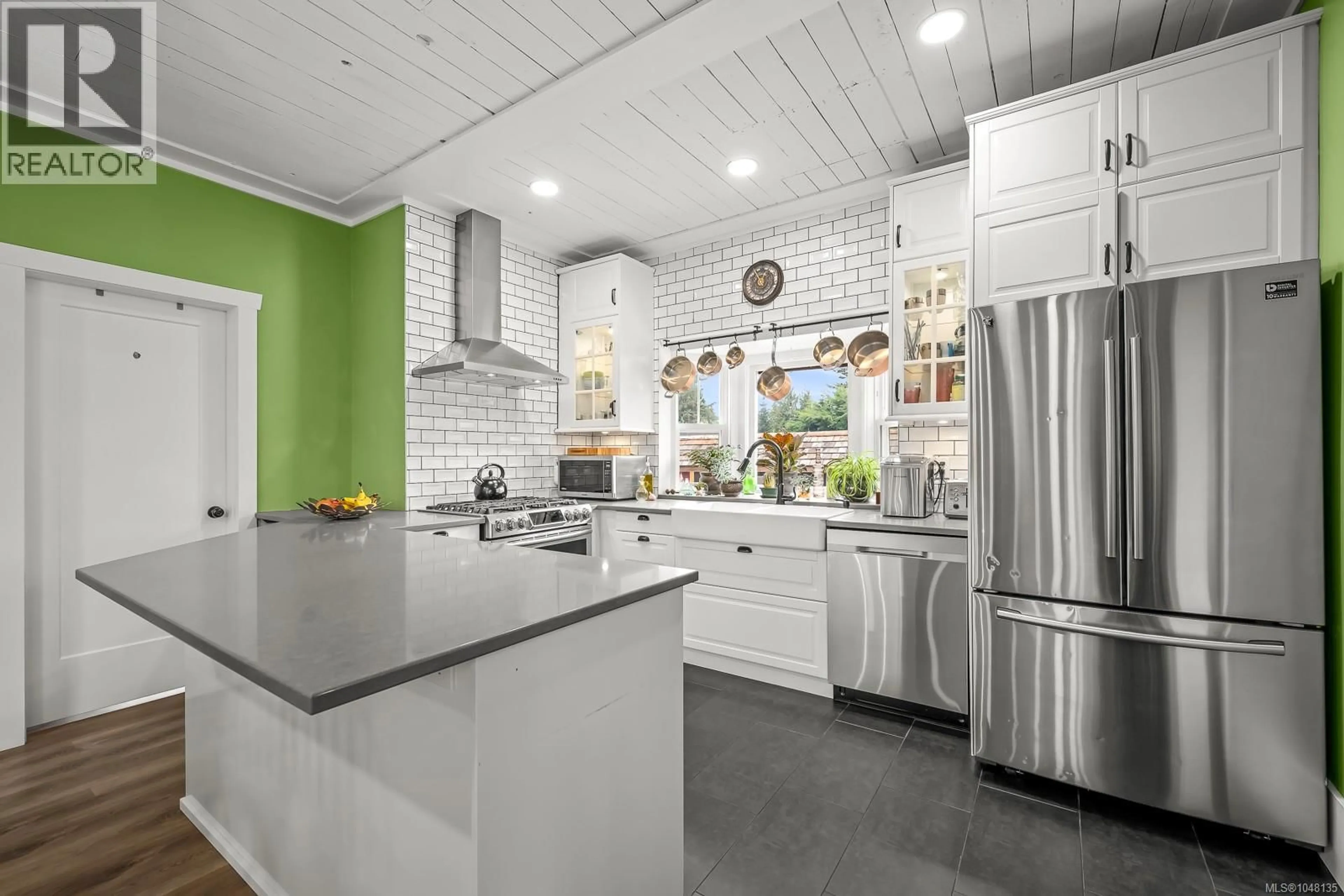 Open concept kitchen, ceramic/tile floor for 4689 CUMBERLAND ROAD, Cumberland British Columbia V0R1S0