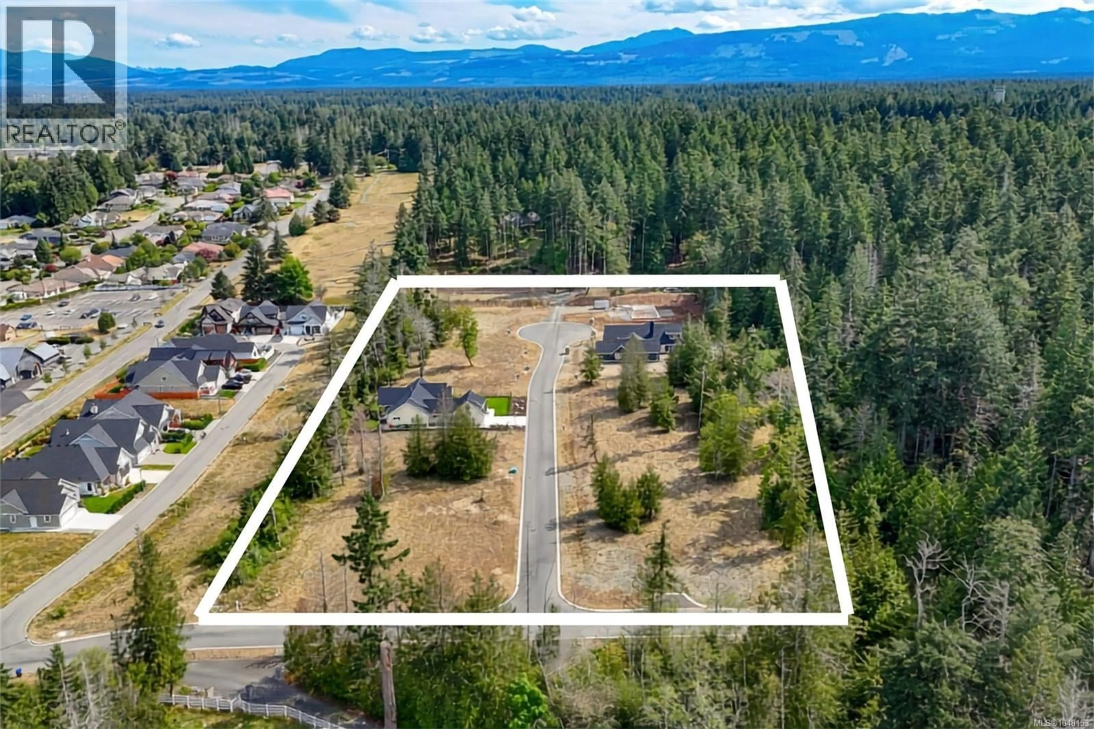 A pic from outside/outdoor area/front of a property/back of a property/a pic from drone, mountain view for 453 CAMASSIA CLOSE, Qualicum Beach British Columbia V9K1G1