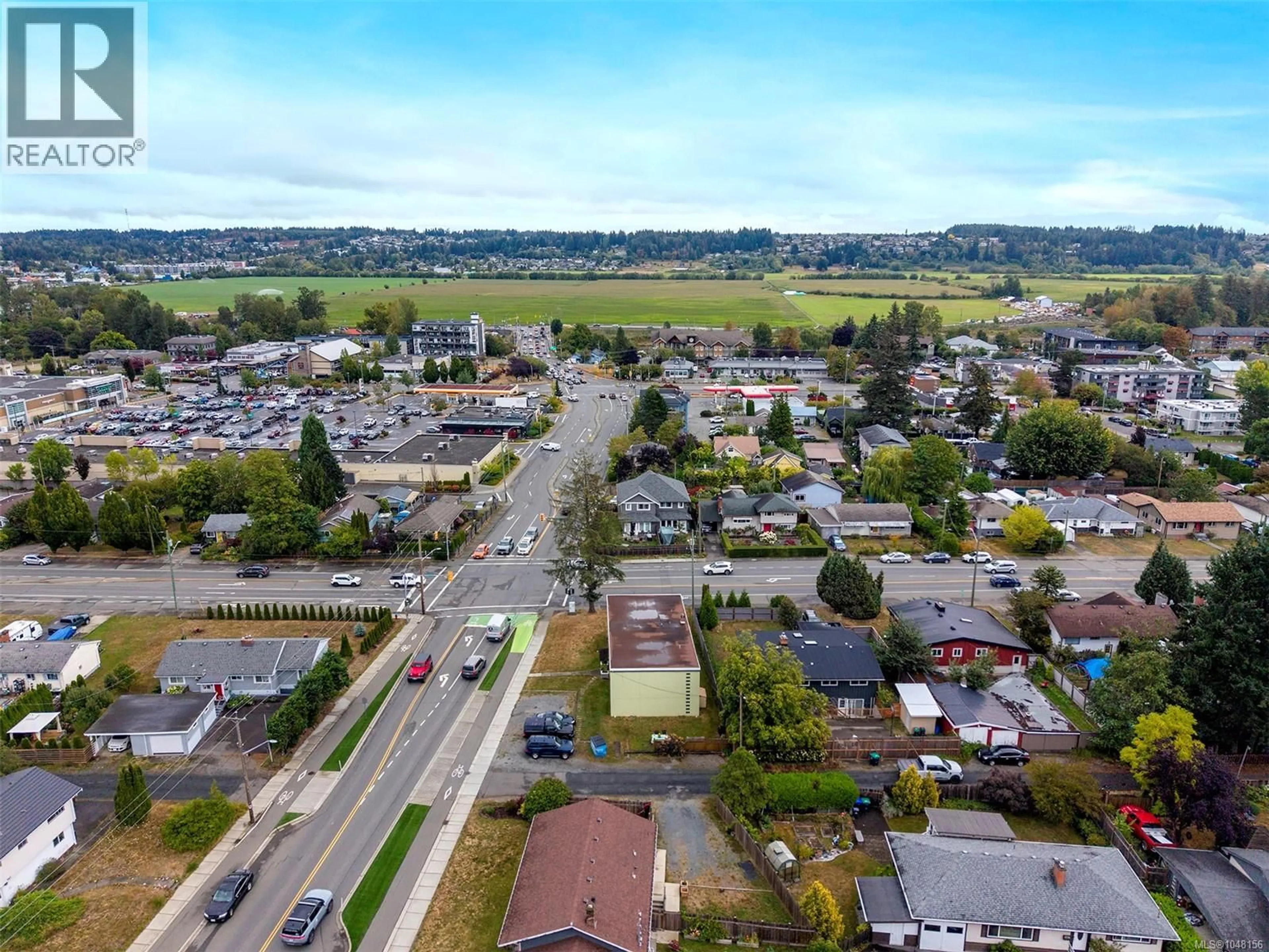 A pic from outside/outdoor area/front of a property/back of a property/a pic from drone, street for 504 17TH STREET, Courtenay British Columbia V9N1Y8