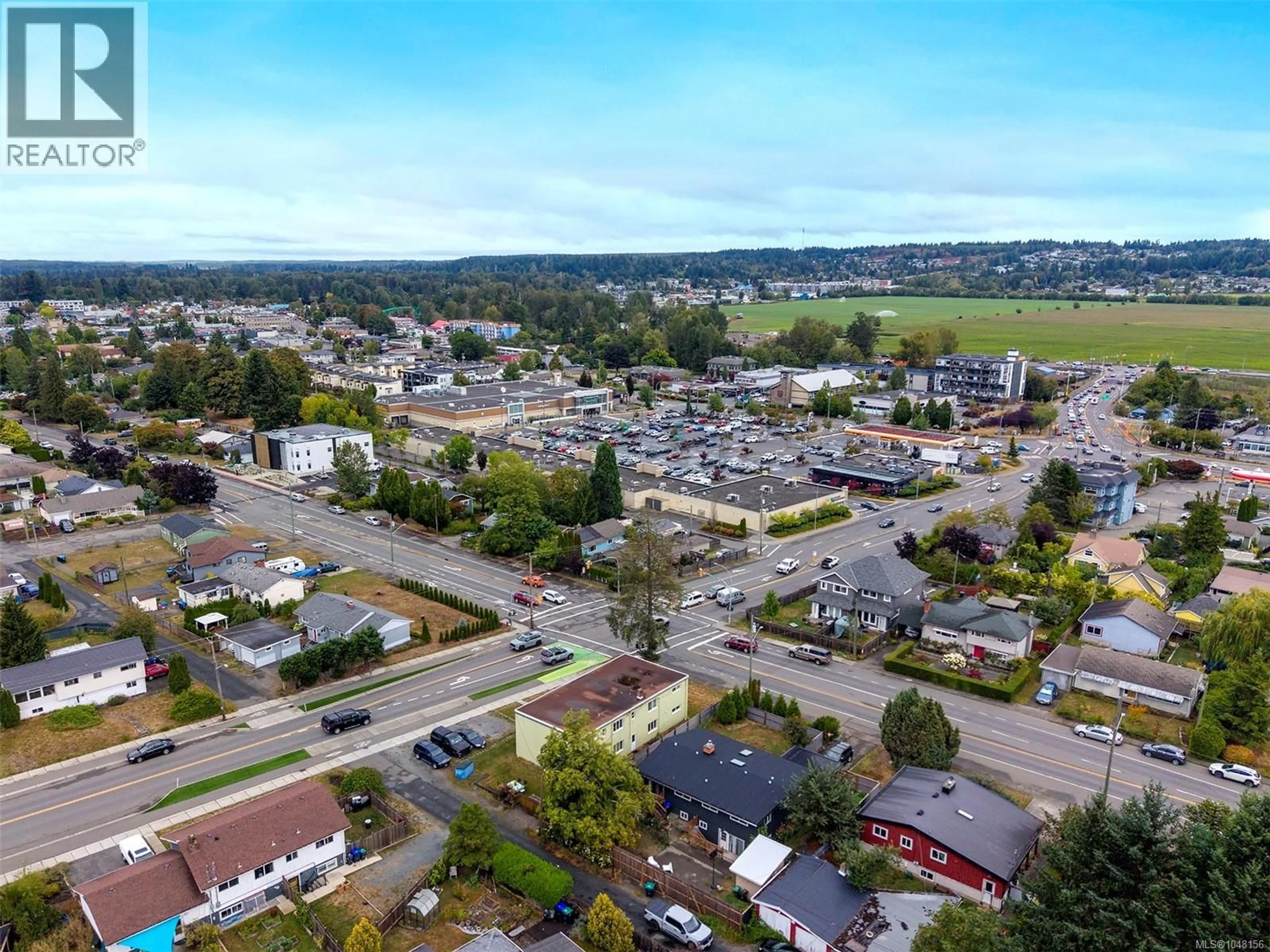 A pic from outside/outdoor area/front of a property/back of a property/a pic from drone, street for 504 17TH STREET, Courtenay British Columbia V9N1Y8