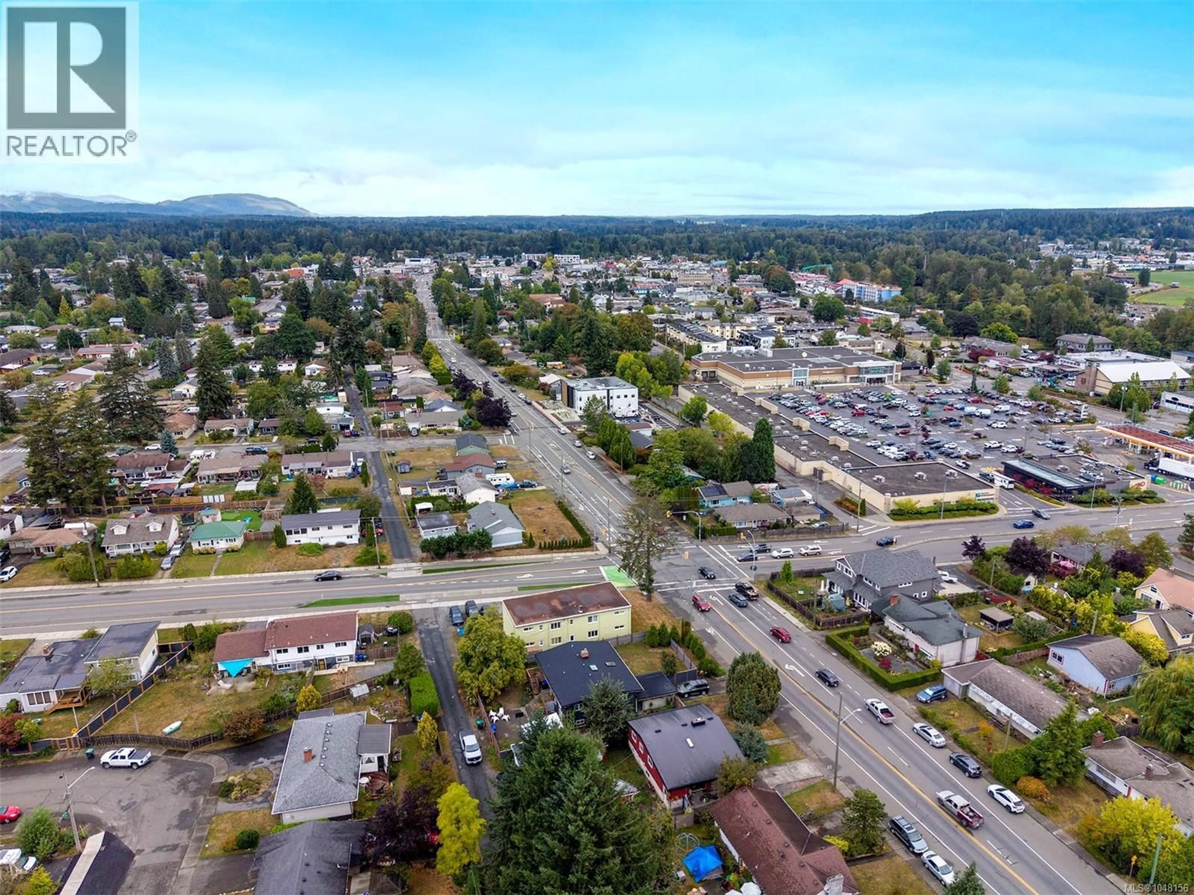 A pic from outside/outdoor area/front of a property/back of a property/a pic from drone, mountain view for 504 17TH STREET, Courtenay British Columbia V9N1Y8