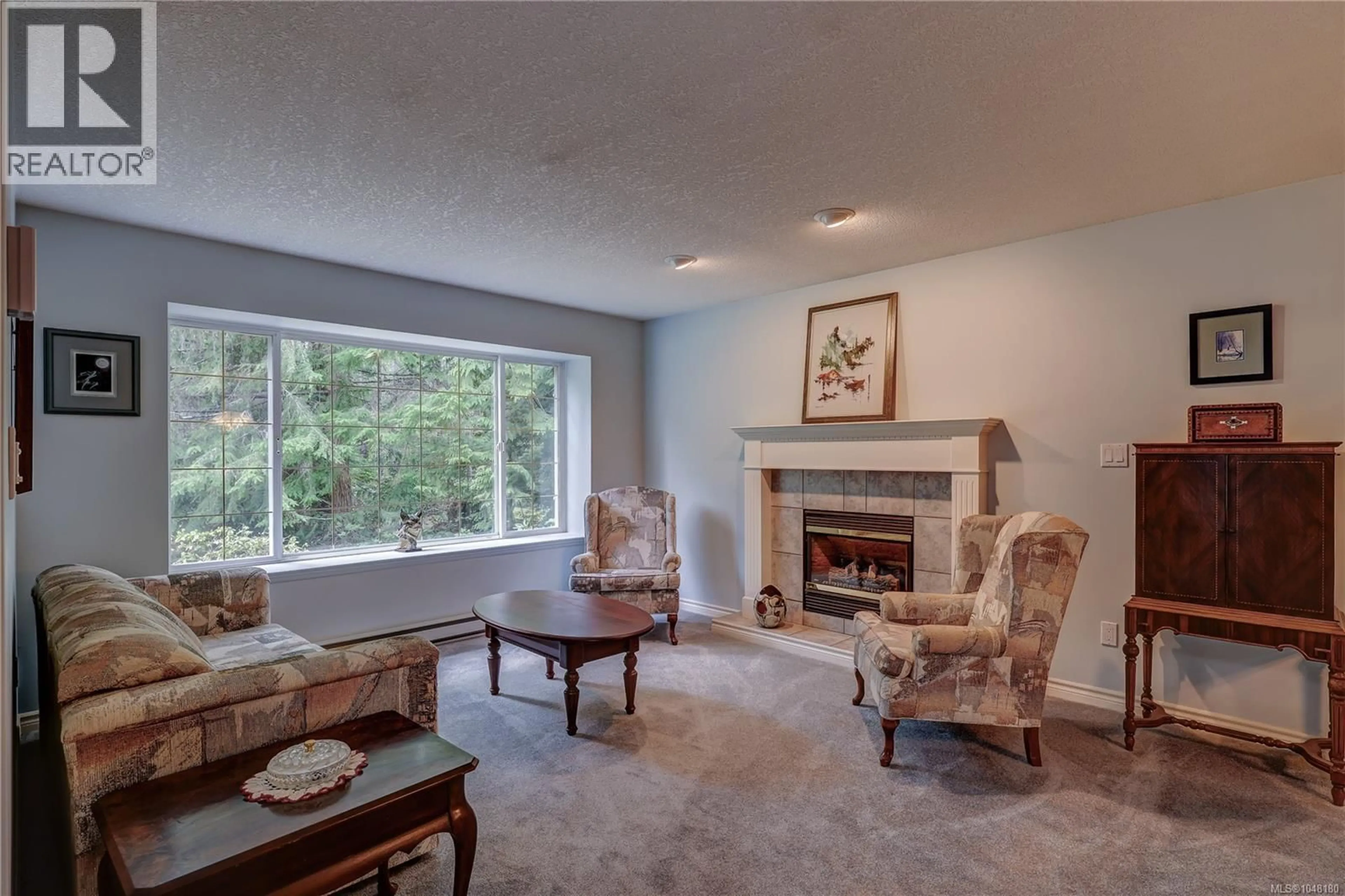 Living room with furniture, unknown for 1377 MEADOWOOD WAY, Qualicum Beach British Columbia V9K2S4