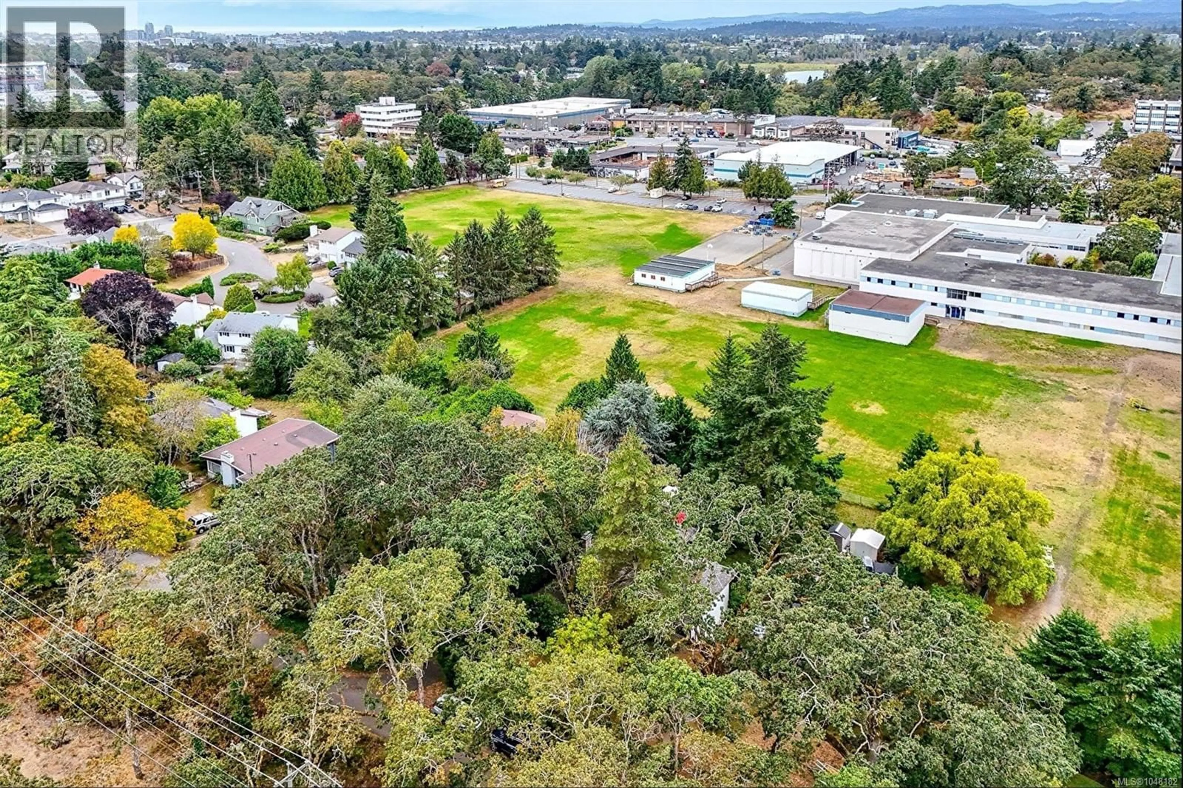A pic from outside/outdoor area/front of a property/back of a property/a pic from drone, mountain view for 3960 CUMBERLAND ROAD, Saanich British Columbia V8P3J8